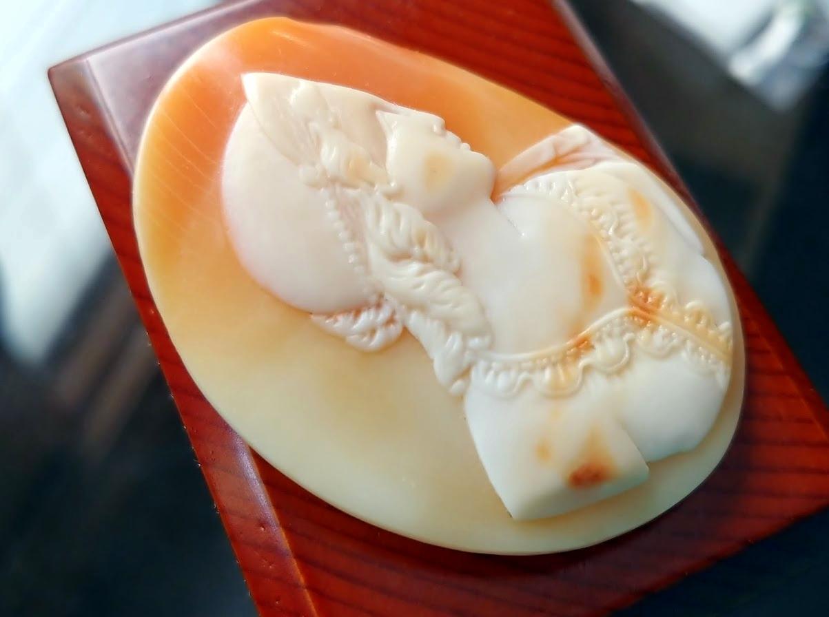 This Victorian unmounted Carnelian shell cameo depicting the right-facing profile of the Princess is very well carved in exquisite detail. The surface is as crisp as the day it was crafted, impressive for a shell cameo from the late Victorian era.