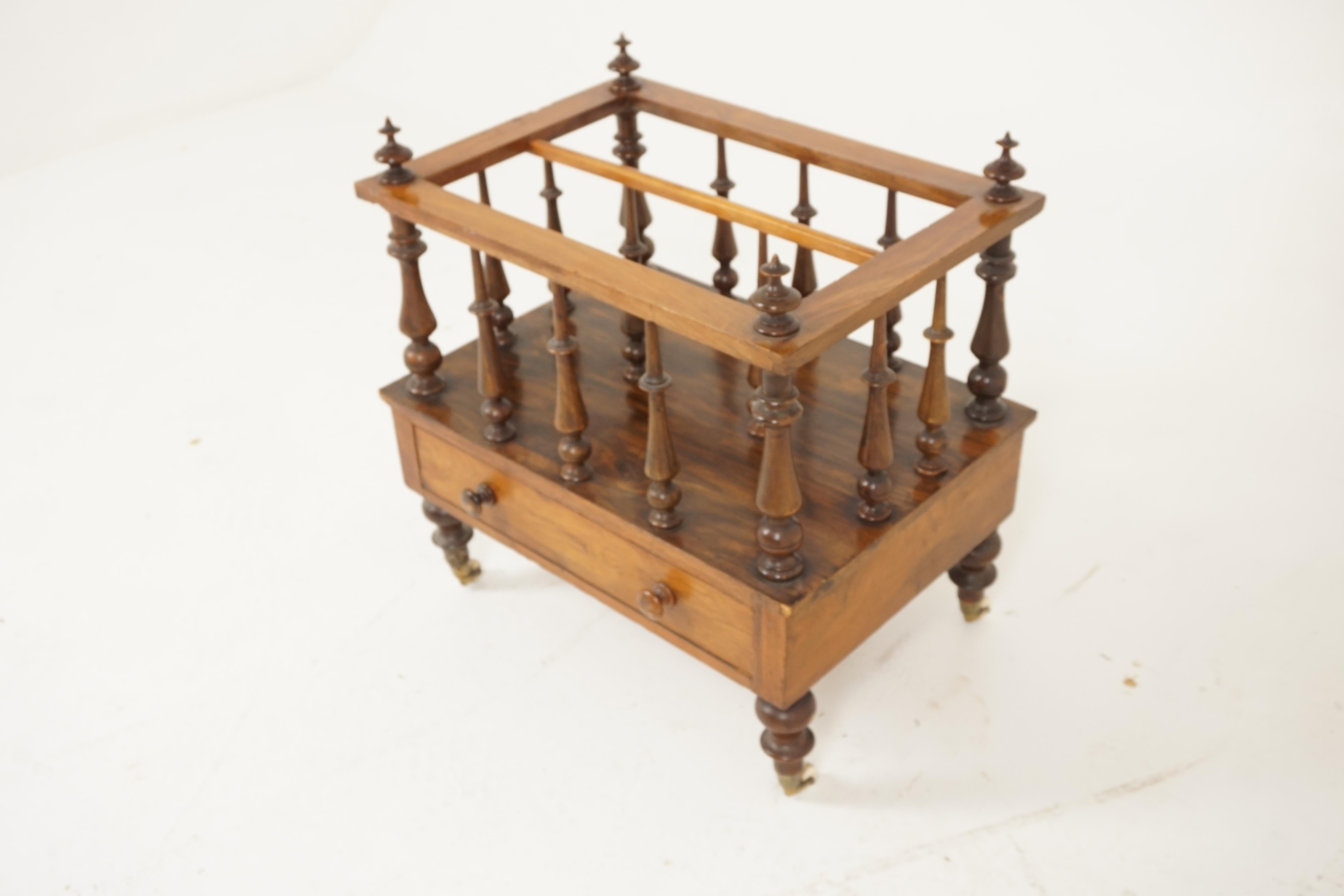 Antique Victorian Canterbury Music/Magazine rack, Wood, Scotland 1870, H316

Scotland 1870
Solid Wood + veneers
Original finish
Moulded top frame with uprights to each corner topped with pretty finials
Two division with turned spindles
Single drawer