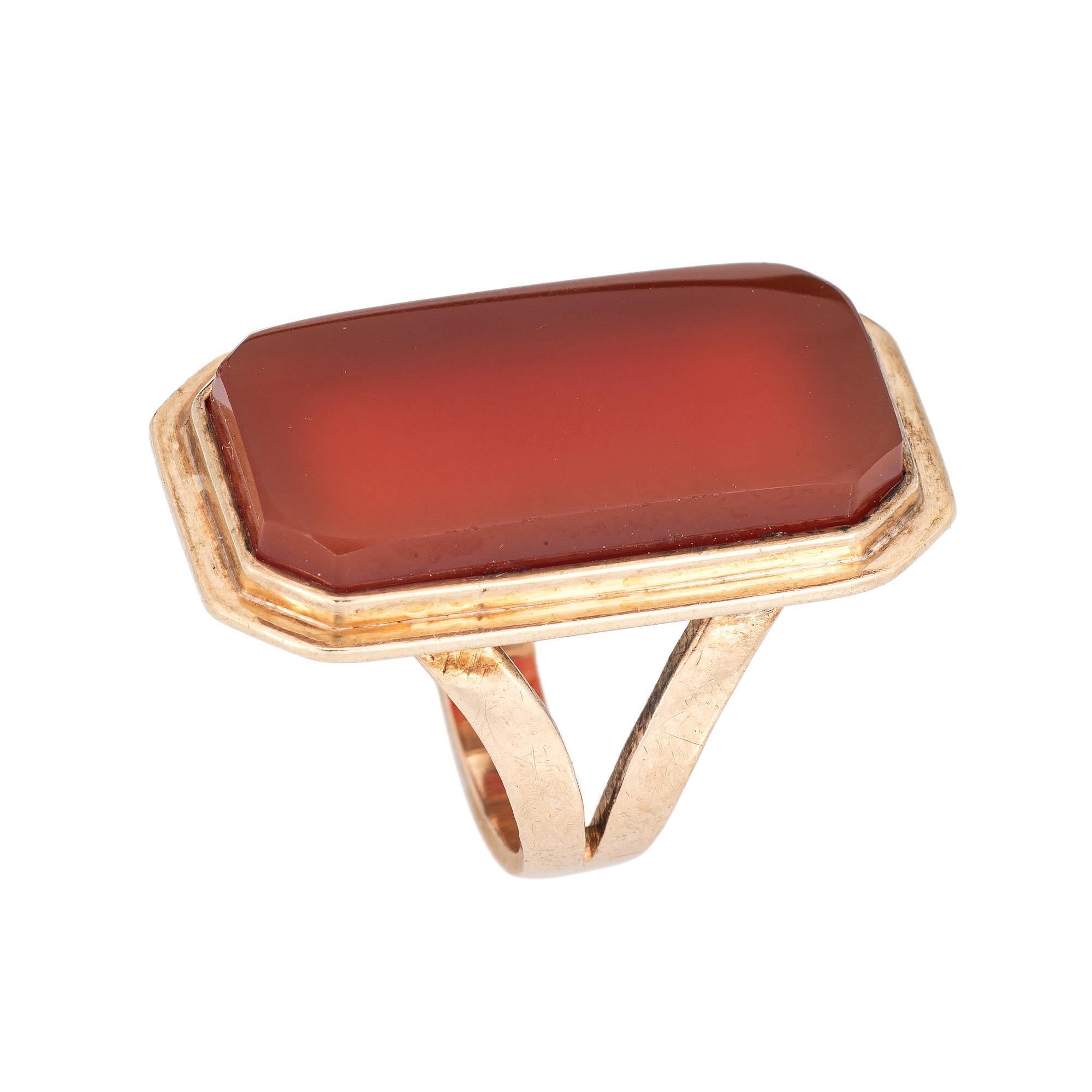Stylish antique Victorian carnelian ring (circa 1980s to 1900s) crafted in 14 karat yellow gold. 

Carnelian measures 22mm x 11mm (estimated at 8 carats). The carnelian is in good condition with a few light surface abrasions visible under a 10x