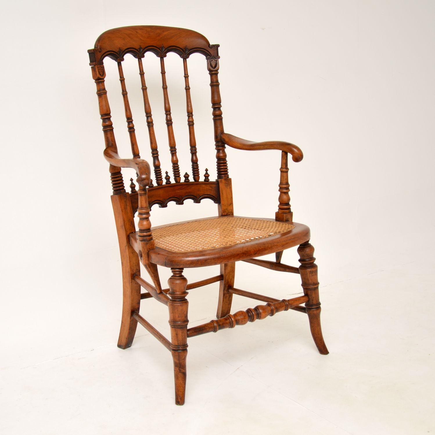 An extremely beautiful Victorian armchair which I think is solid elm. This was made in England, it dates from around the 1860-1880 period.

It is of amazing quality and has a stunning design. The frame is constructed of wonderfully turned sections