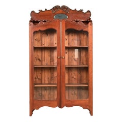 Antique Victorian Carved Cherry Wood Two-Door Bookcase Cabinet, Circa 1880s