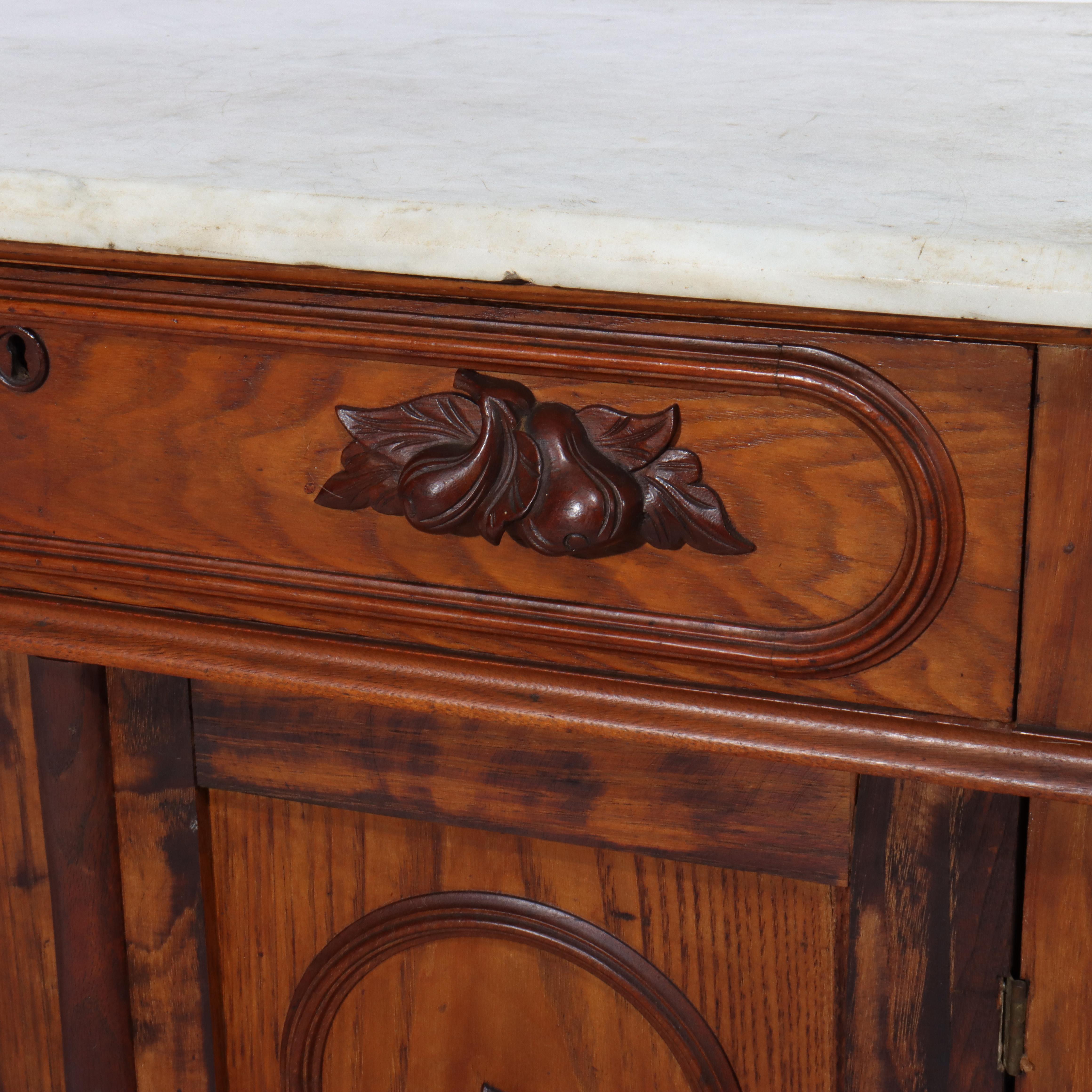 Antique Victorian Carved Chestnut & Walnut Marble Top Washstand C1880

Measures - 30 7/8