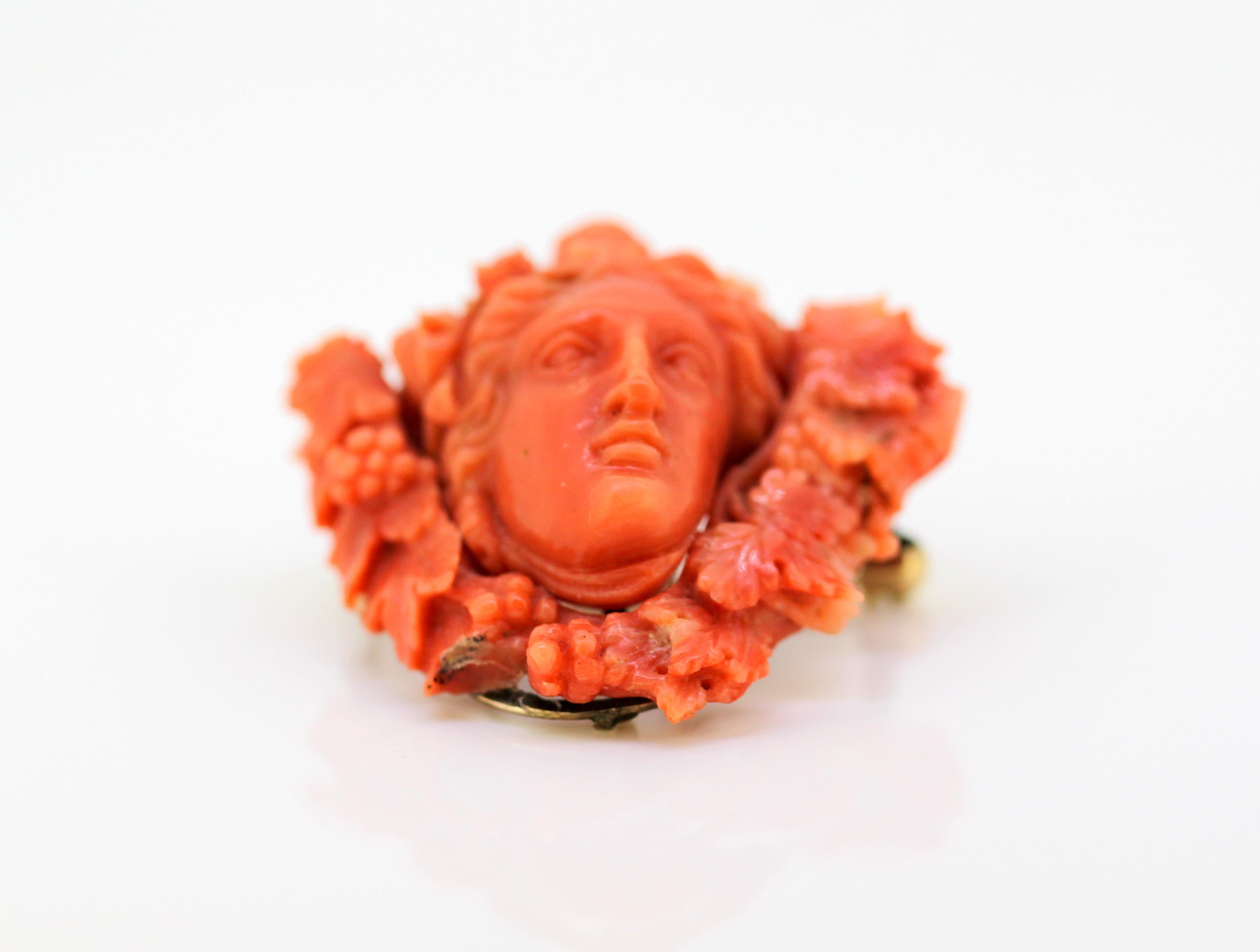 Antique Victorian carved coral brooch / pendant with 15k gold
Circa 1880's

Approx Dimensions - 
Size : 5.2 x 4.4 x 2.3 cm
Weight : 25 grams

Condition: Carved coral has a small chip on the bottom (see picture 2), general wear and subtle signs of