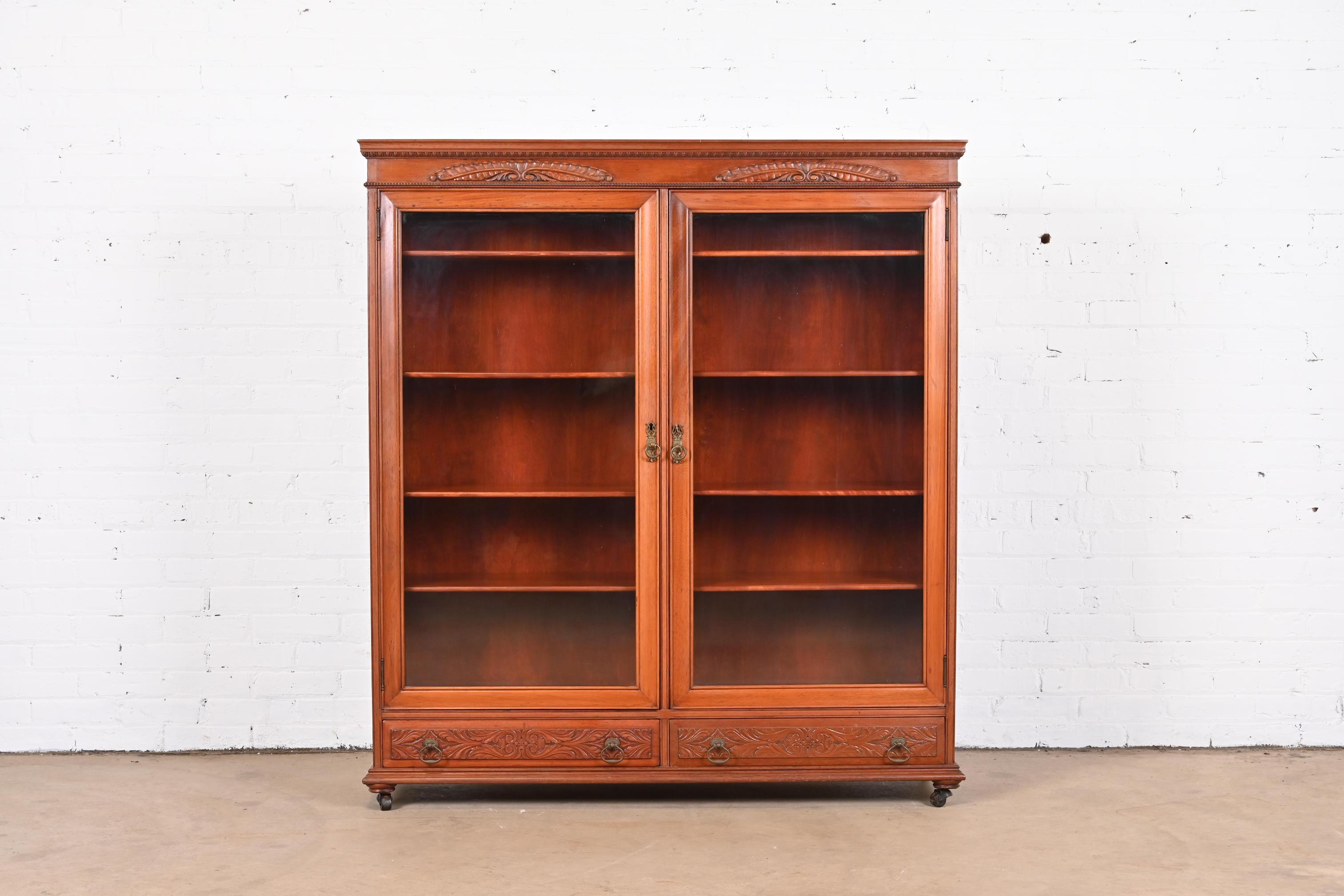 American Antique Victorian Carved Mahogany Glass Front Double Bookcase, Circa 1900