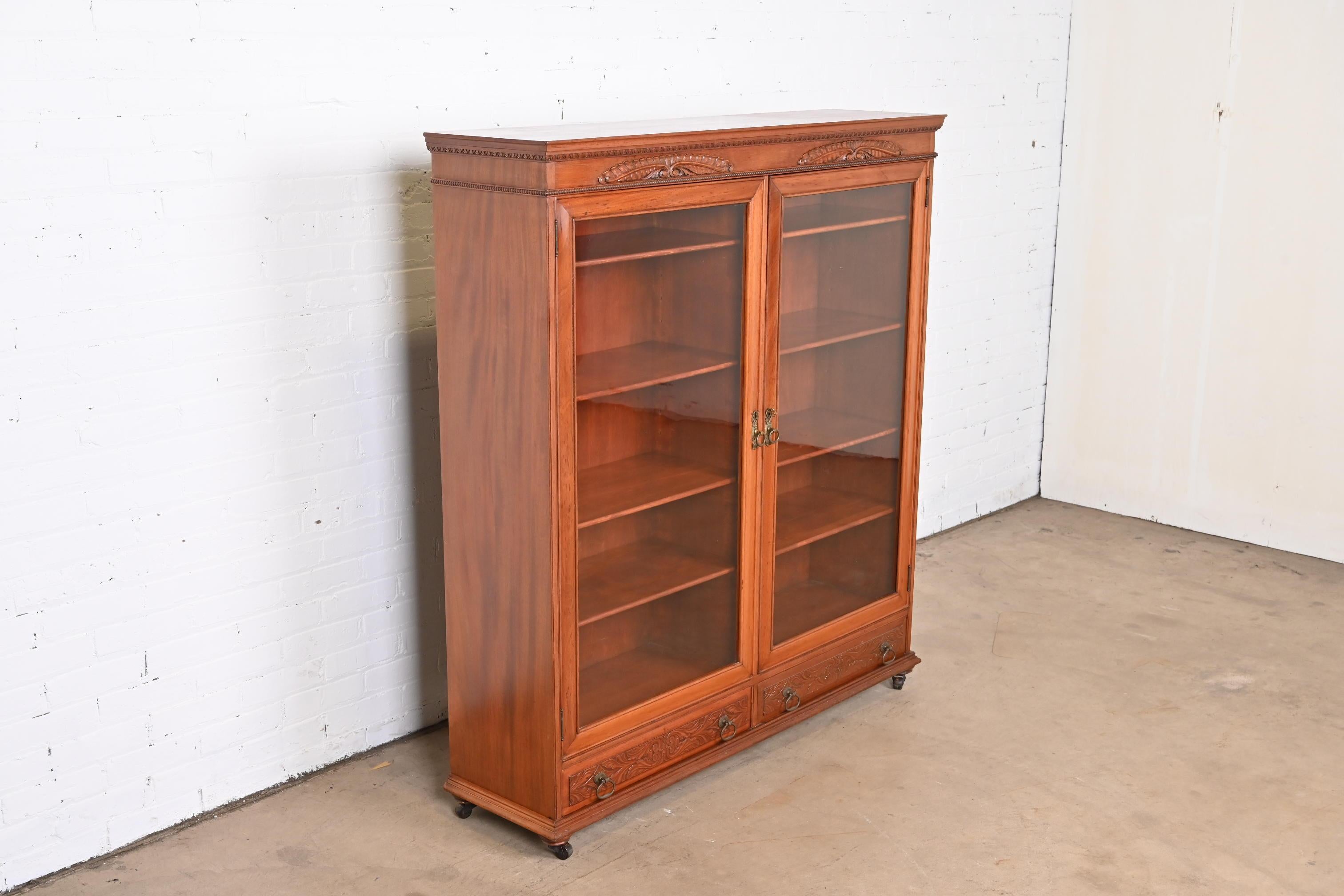 Antique Victorian Carved Mahogany Glass Front Double Bookcase, Circa 1900 In Good Condition In South Bend, IN