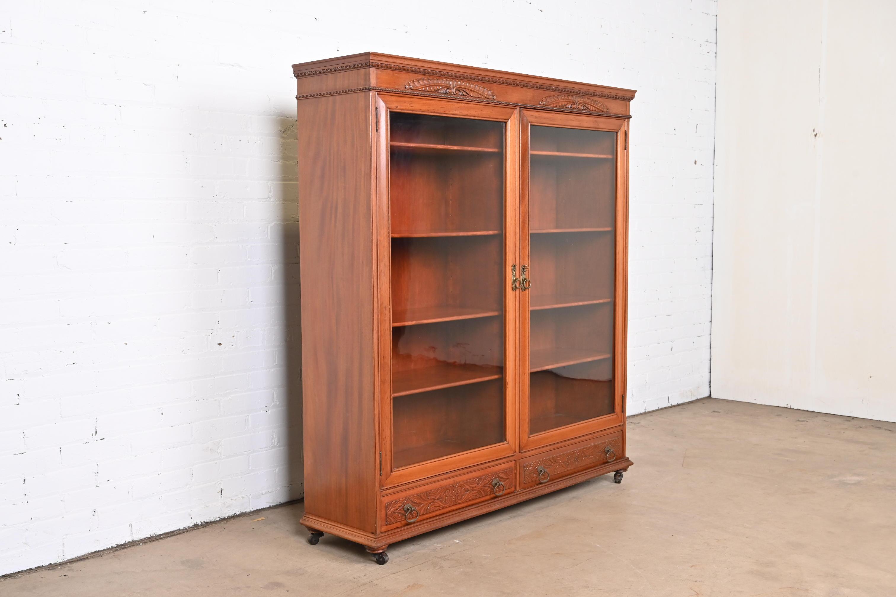 20th Century Antique Victorian Carved Mahogany Glass Front Double Bookcase, Circa 1900