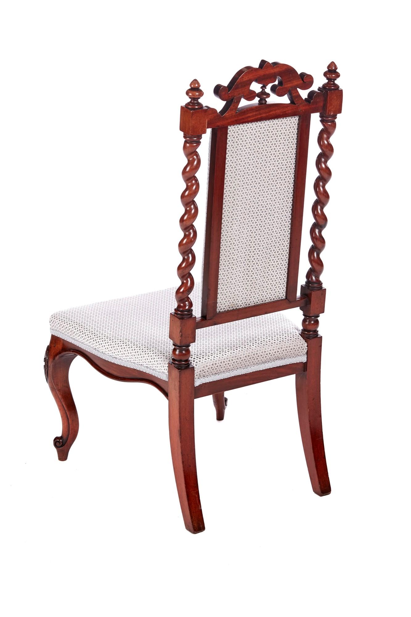 Antique Victorian carved mahogany hall chair having a lovely carved shaped top, solid mahogany barley twist supports standing on shaped carved cabriole legs to the front, out swept back legs. New re-upholstered in a quality fabric.
Lovely color and