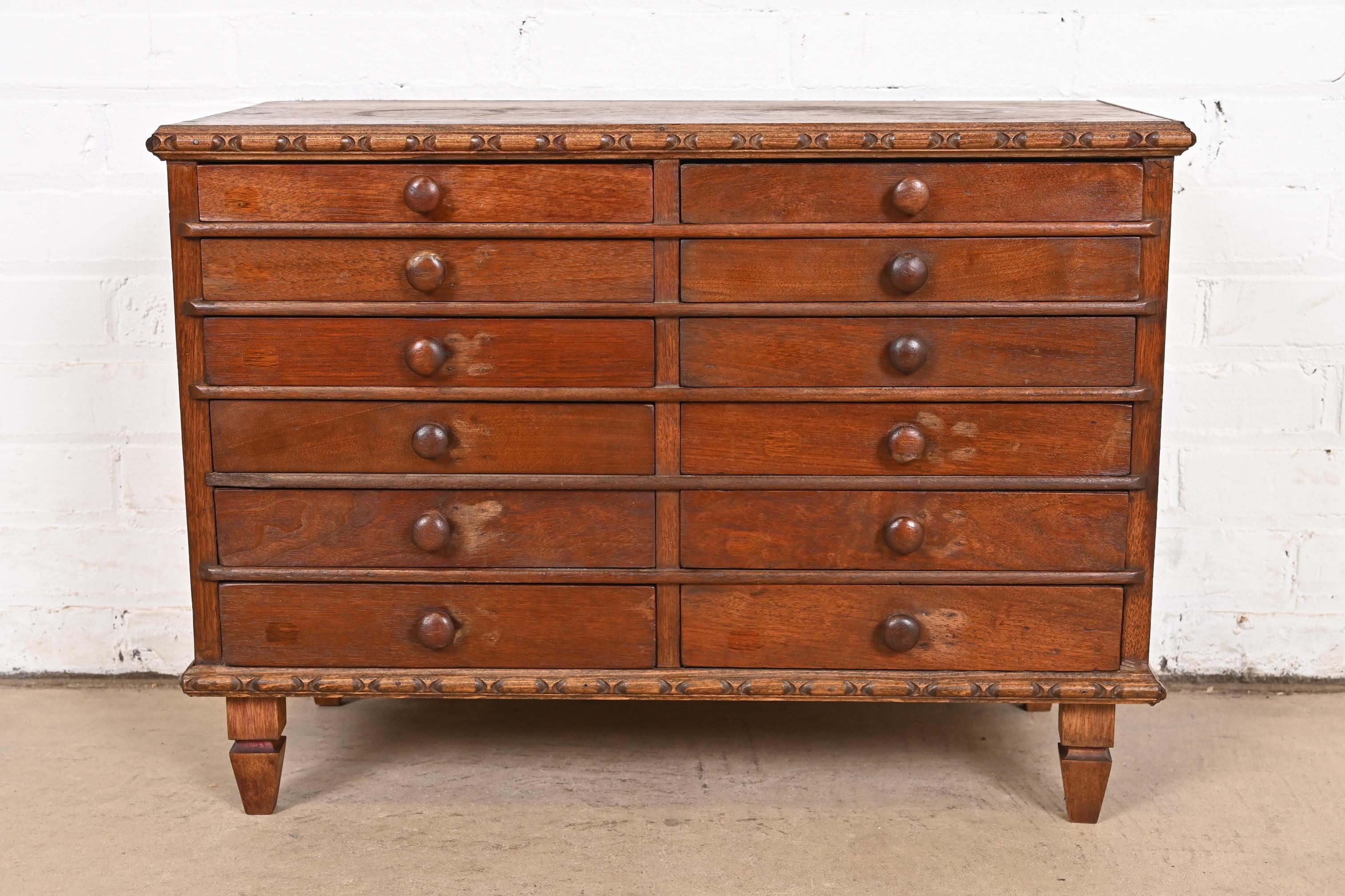 American Antique Victorian Carved Mahogany Twelve-Drawer Collector's Cabinet, Circa 1880s For Sale