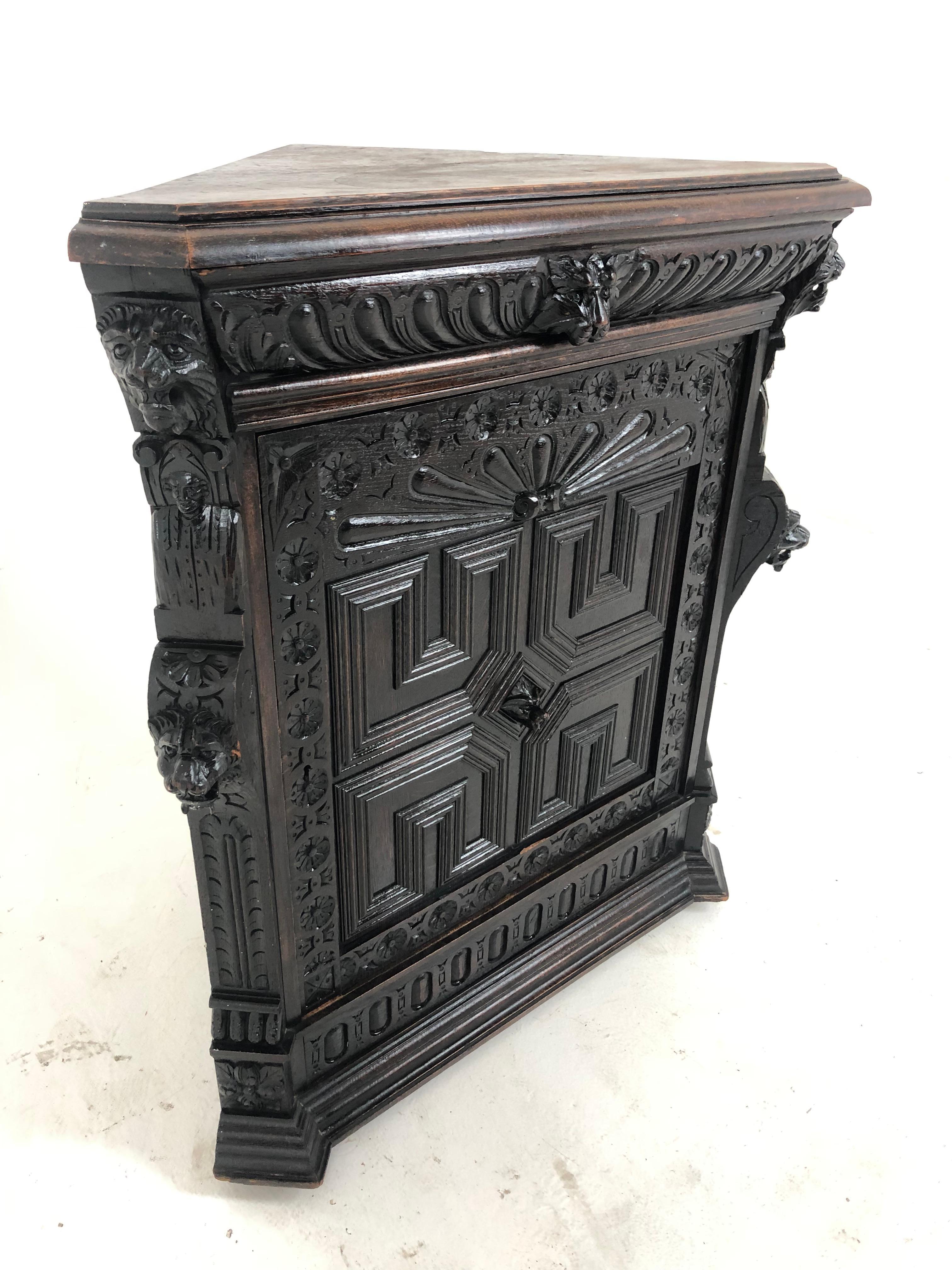 Antique Victorian carved oak corner cabinet 