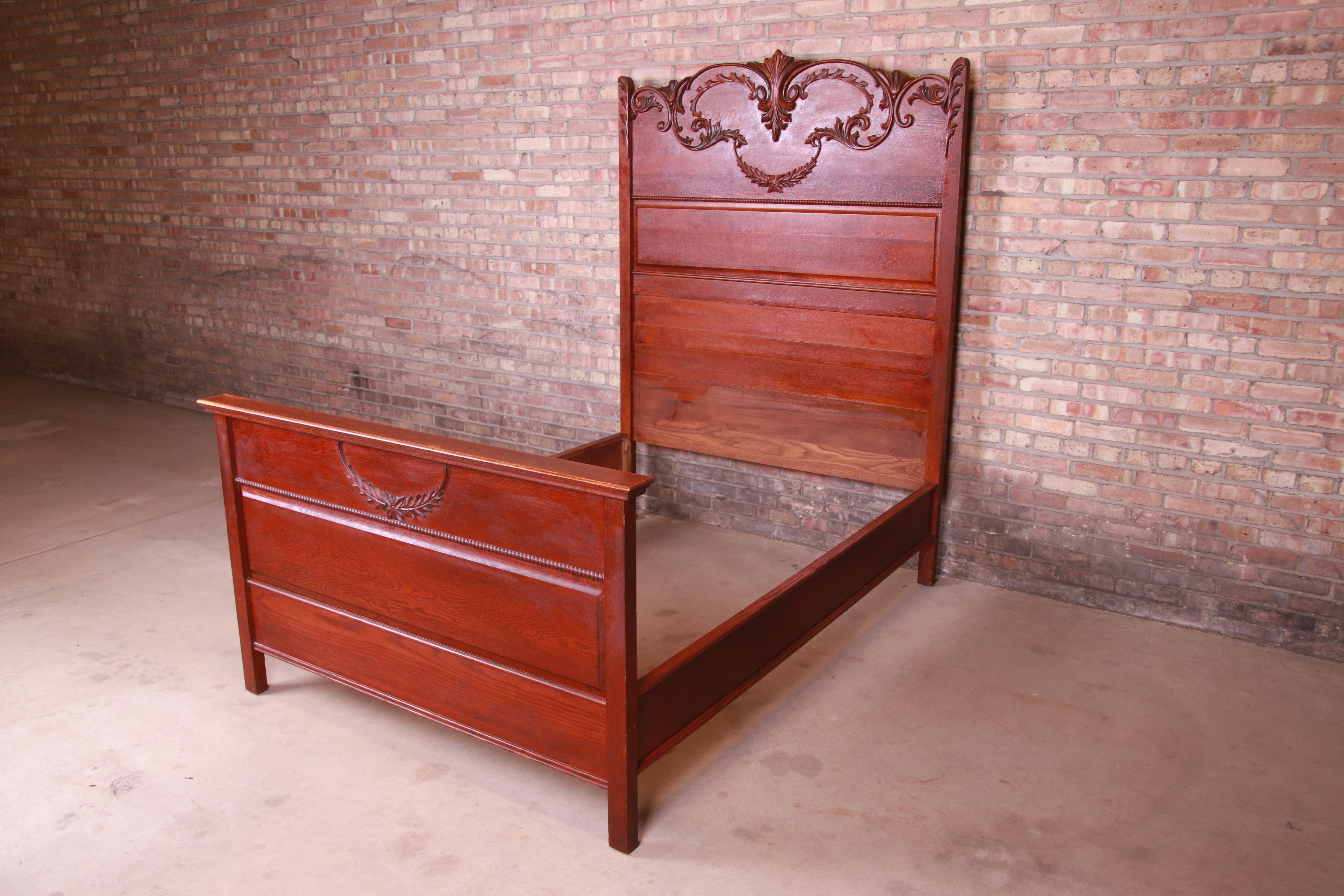 A gorgeous antique Victorian carved oak full size bed frame

USA, circa 1900

Measures: 60