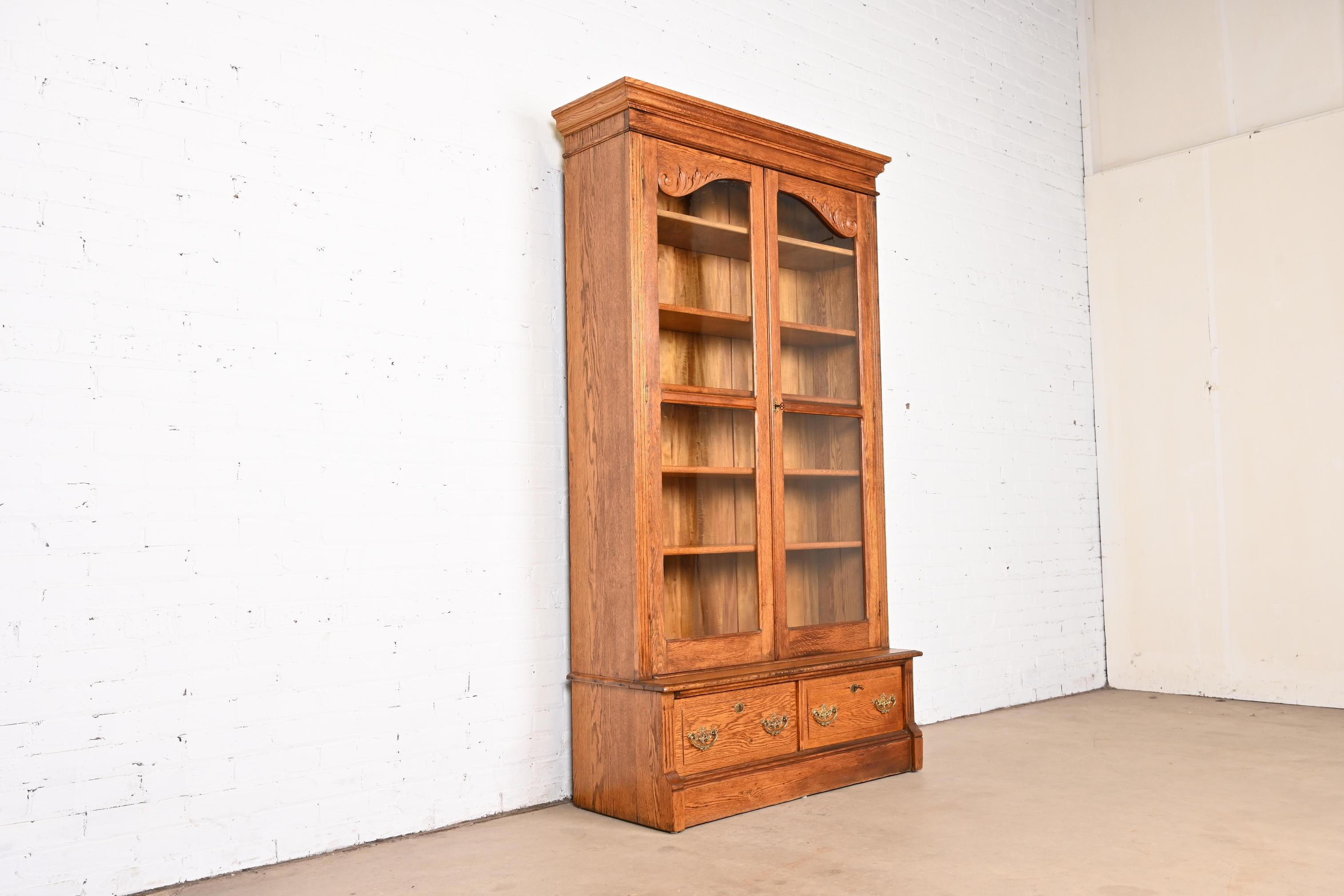 Antique Victorian Carved Oak Glass Front Bookcase, Circa 1900 In Good Condition For Sale In South Bend, IN