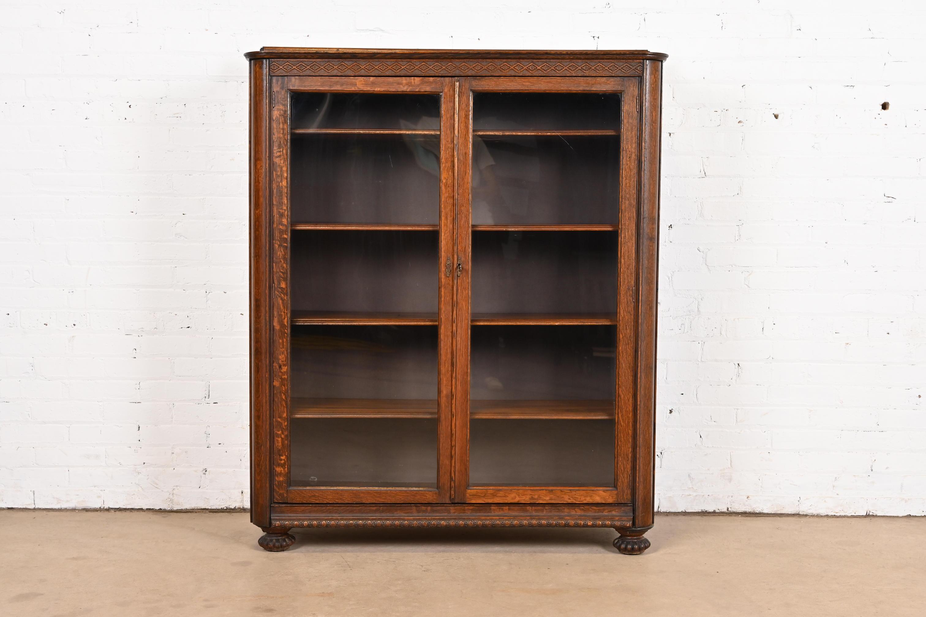 American Antique Victorian Carved Oak Glass Front Double Bookcase, Circa 1900