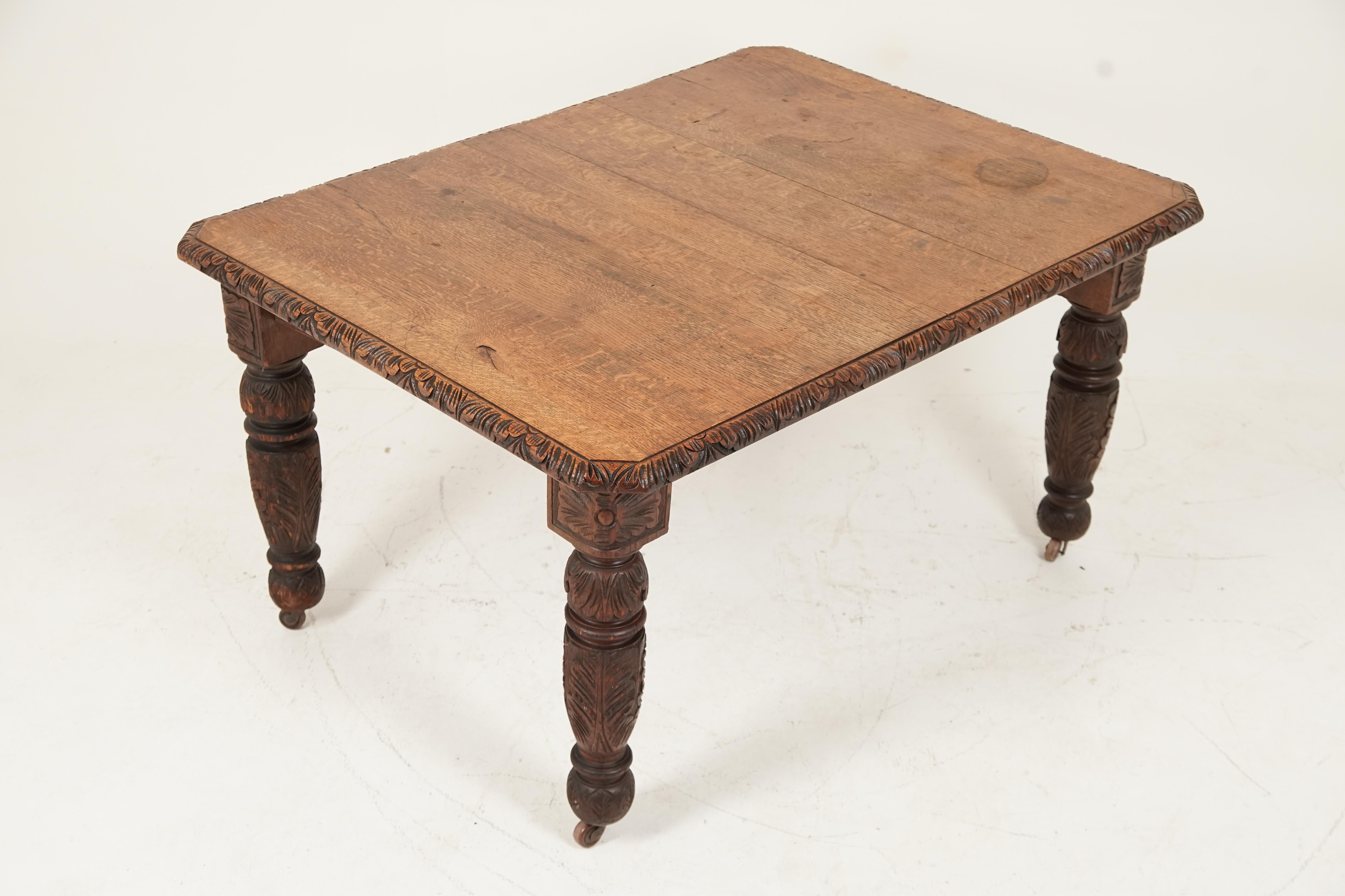 Antique Victorian carved oak extending gothic 2 leaf dining table, Scotland 1870, B2450 

Scotland 1870
Solid oak
Original finish
Two inch thick table top with carved rounded border
Standing on 4 carved solid oak Gothic style legs 5