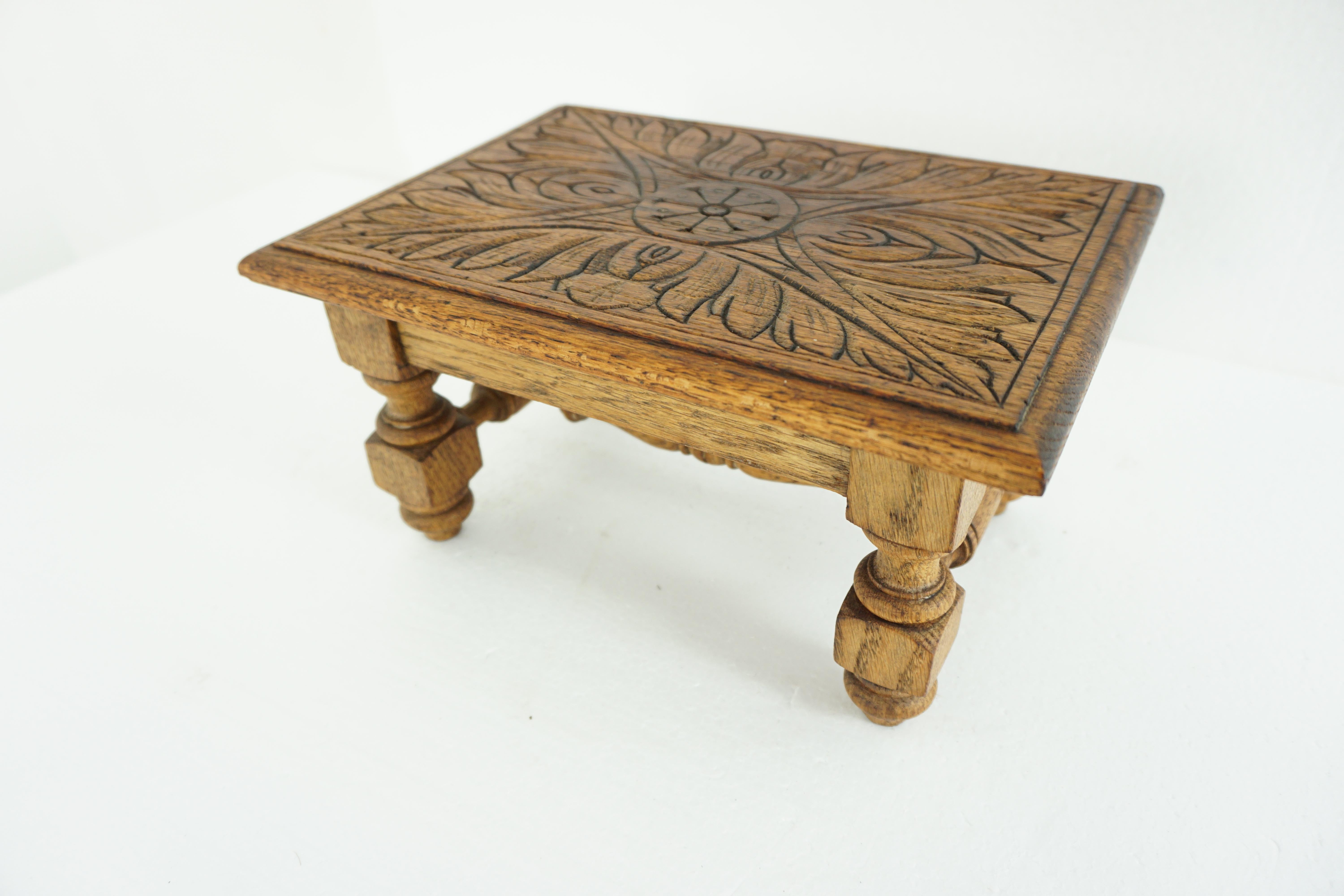 Antique Victorian carved oak Gothic Revival footstool, Scotland 1890 1812

Scotland

1890

Solid oak

Original finish

Carved rectangular flower motif top

Moulded edge

Sitting on four short turned legs 

With centre turned