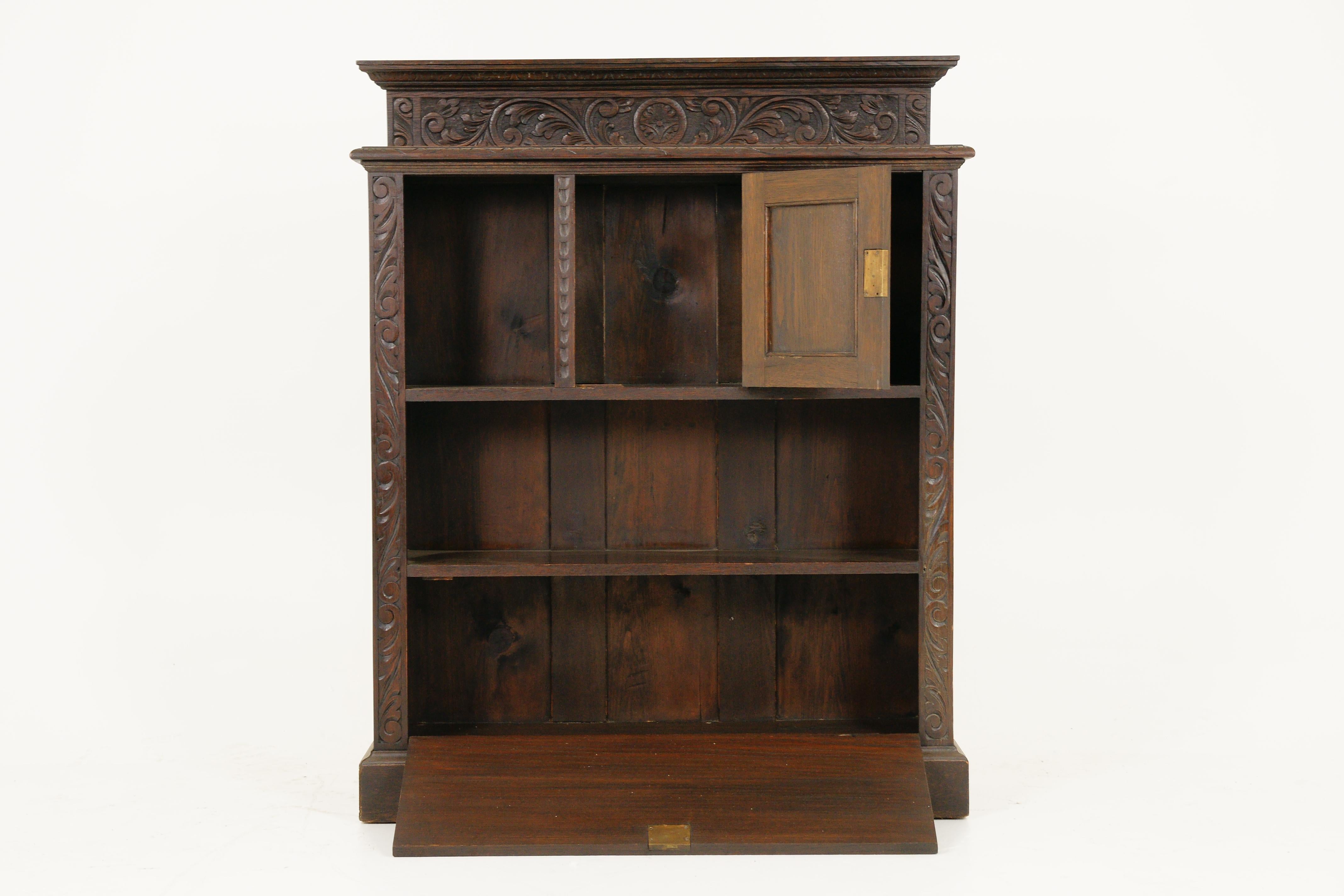 Antique Victorian carved oak open bookcase, display cabinet, Scotland 1870 B1740

$1250

Scotland, 1870
Solid oak
Original finish
Solid carved back rail
Rectangular top
Central carved door opens to reveal storage space flanked by a pair of