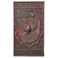 Ancien panneau victorien en chêne sculpté représentant des armoiries