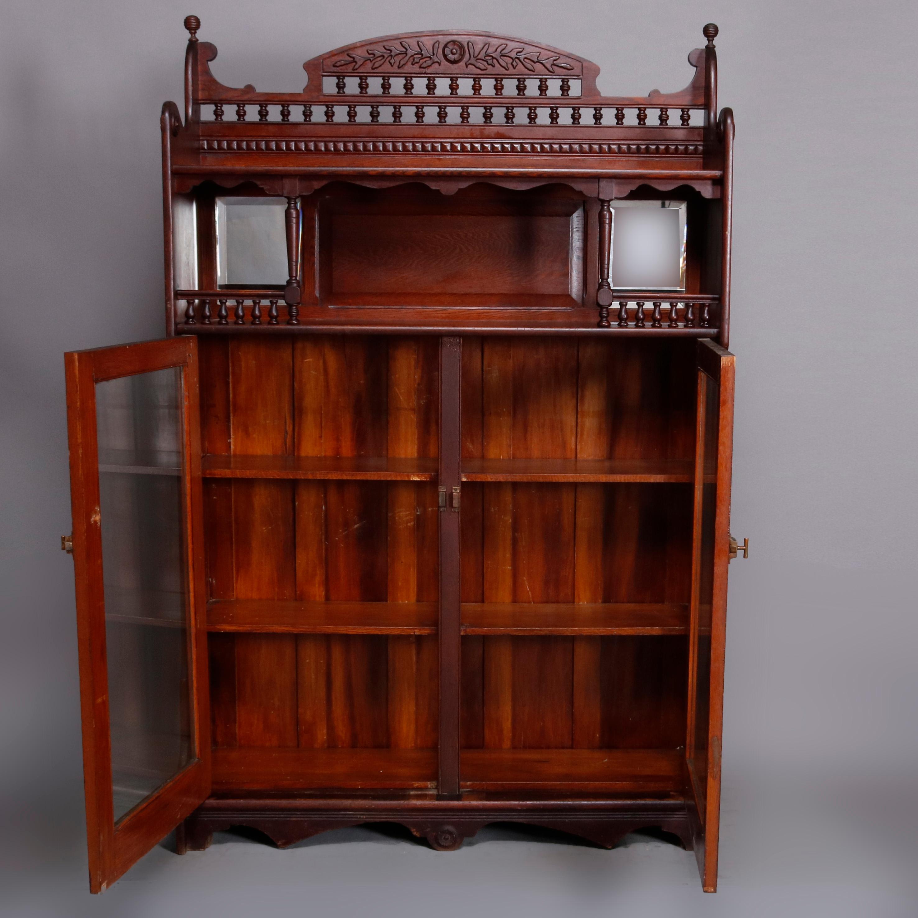 Late Victorian Antique Victorian Carved Oak Stick and Ball Mirrored and Enclosed Bookcase