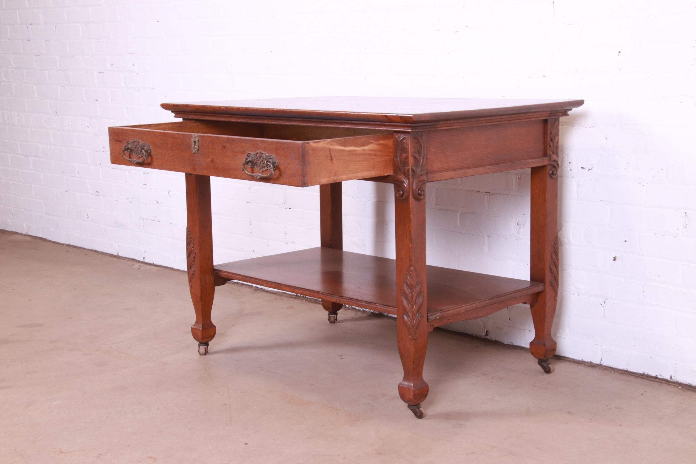 Antique Victorian Carved Oak Writing Desk or Library Table, Circa 1890s For Sale 4