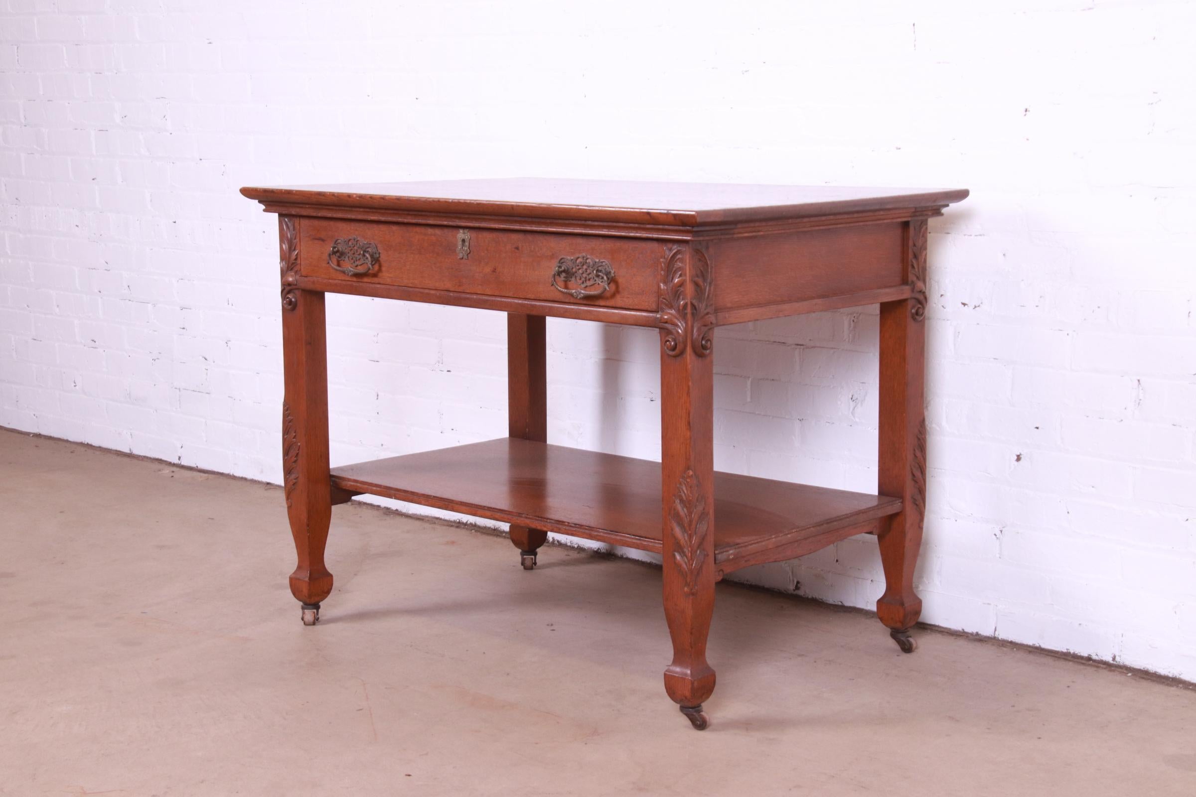 Antique Victorian Carved Oak Writing Desk or Library Table, Circa 1890s In Good Condition For Sale In South Bend, IN