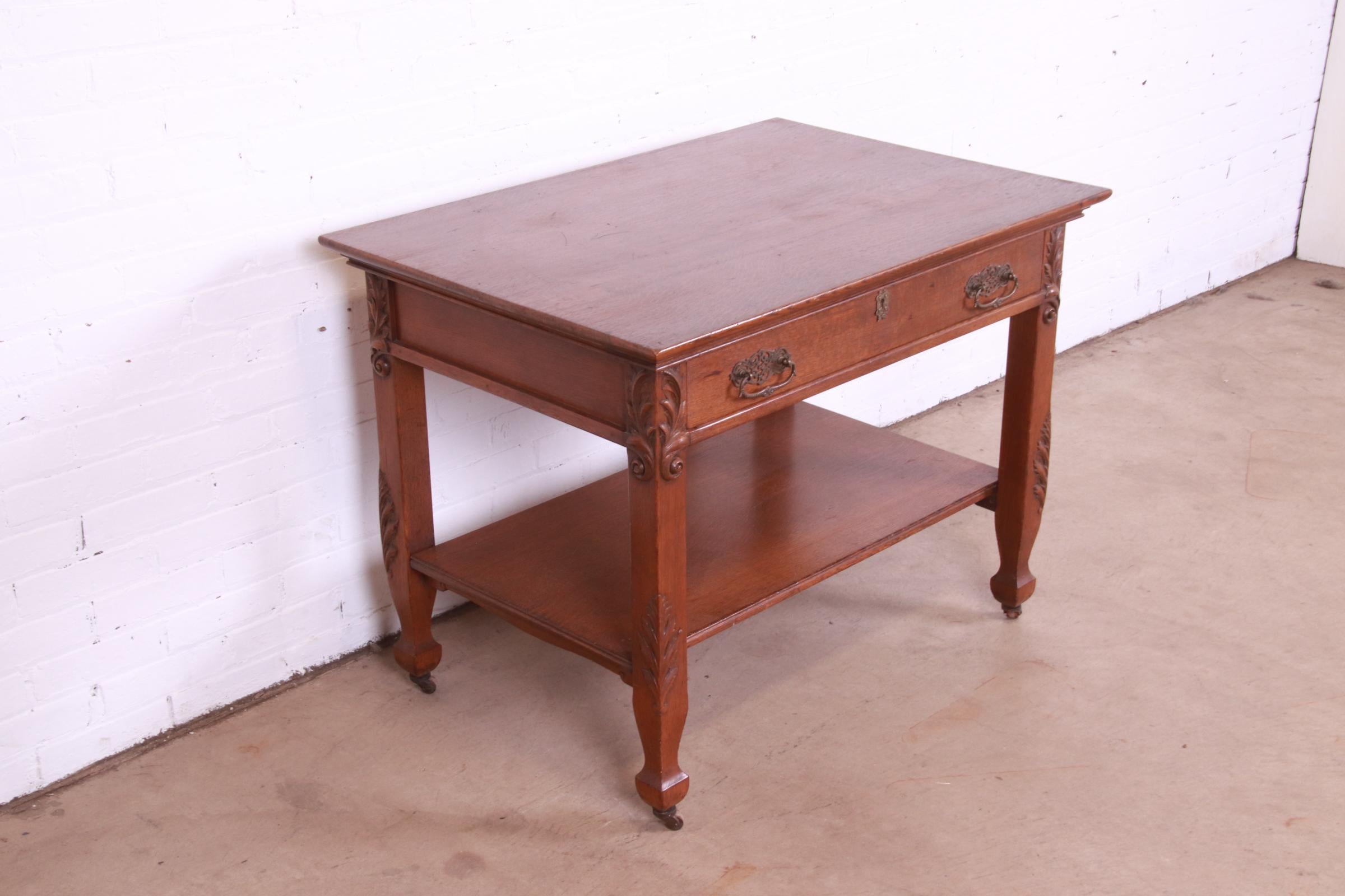 20th Century Antique Victorian Carved Oak Writing Desk or Library Table, Circa 1890s For Sale