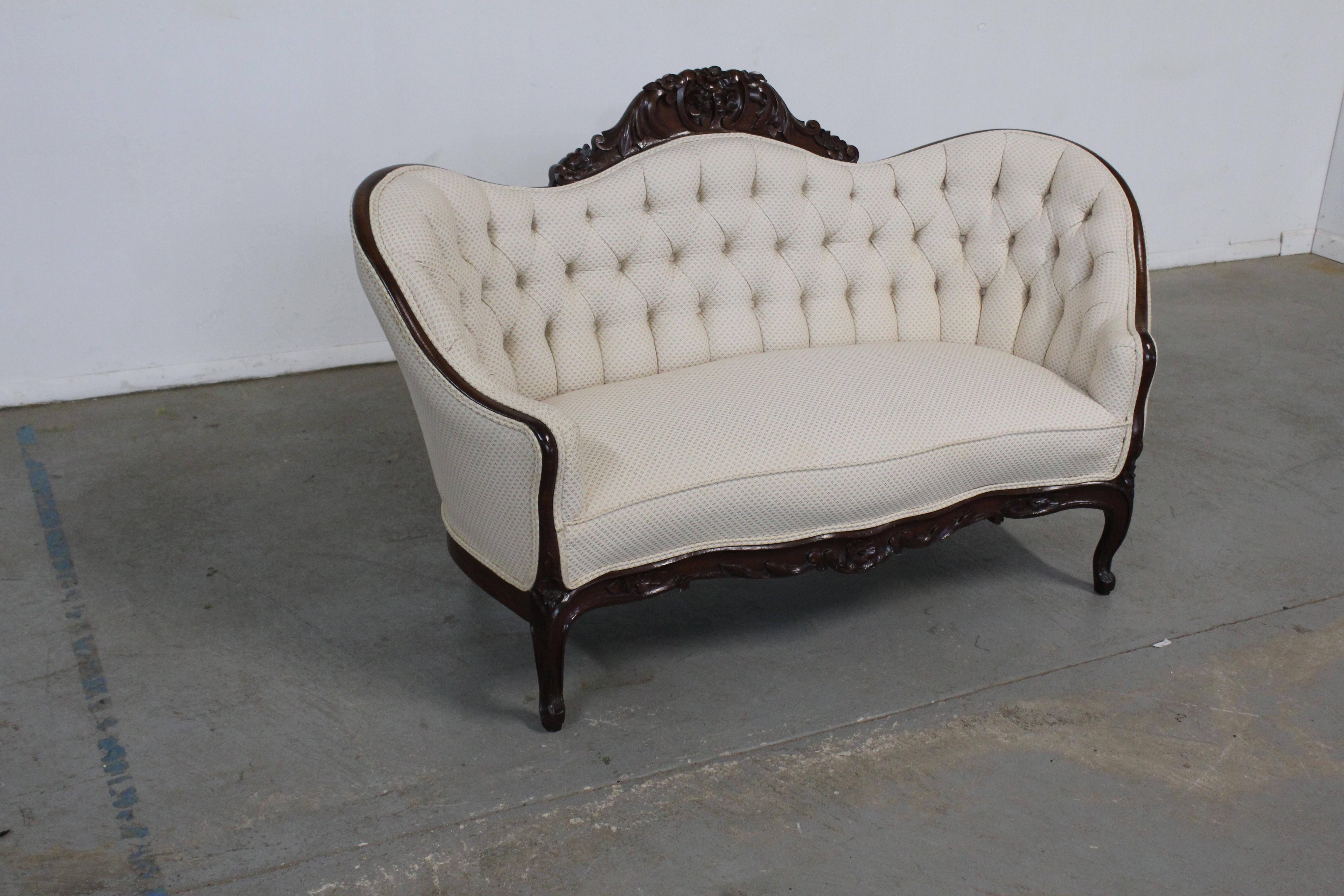 Antique Victorian carved settee/loveseat/sofa.

Offered is a nice Antique Victorian carved settee/loveseat/sofa. The sofa has a great look with nice lines, design, and look. The previous owner had this completely restored( refinished and