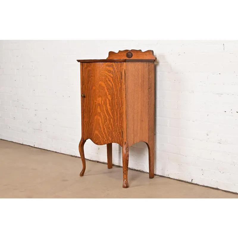 American Antique Victorian Carved Tiger Oak Music Cabinet, Circa 1900 For Sale