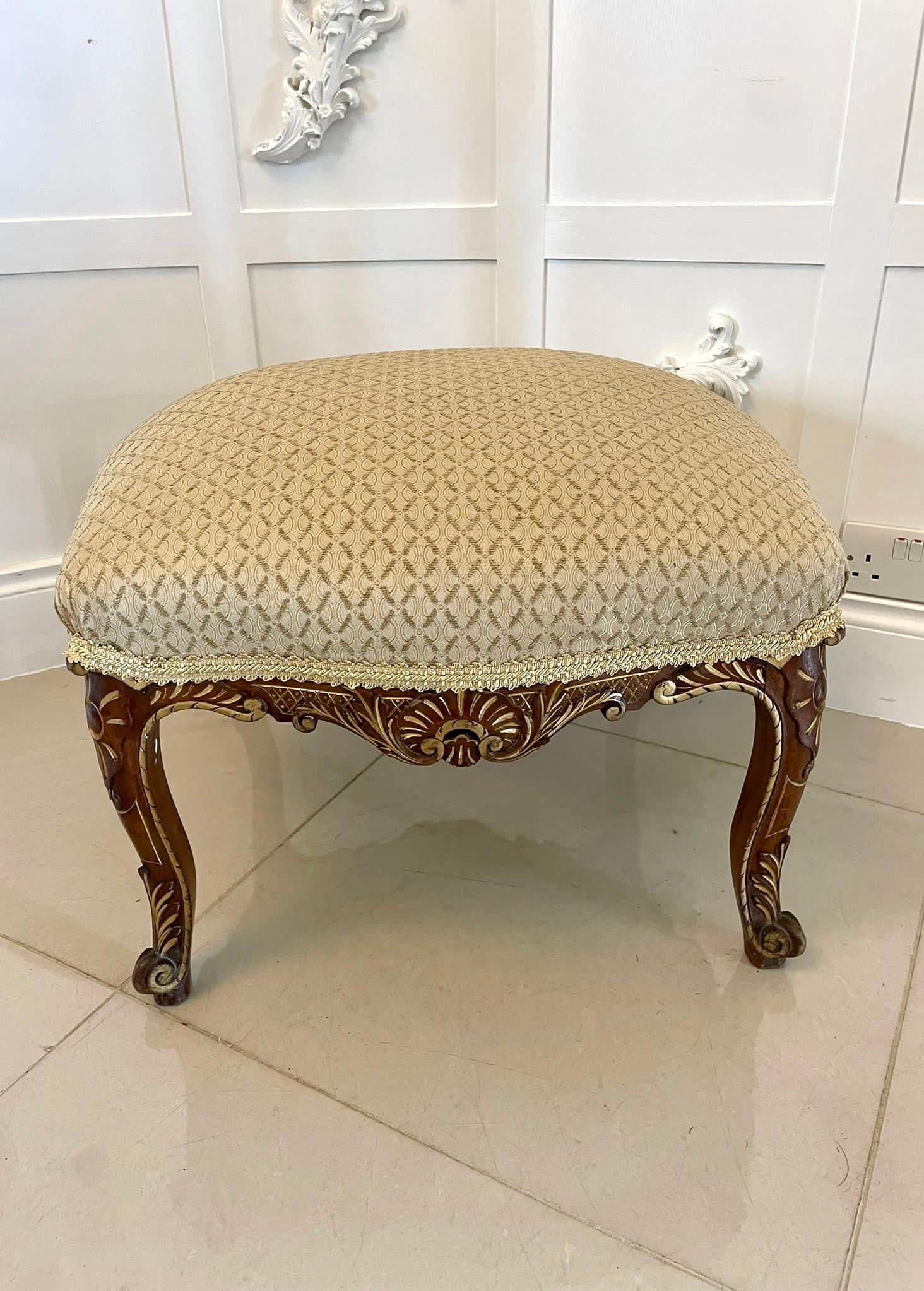 A pretty antique Victorian carved walnut and gilt stool with an elegant shaped carved walnut and gilt frieze raised on four lovely carved walnut and gilt shaped cabriole legs, newly recovered in a quality fabric.

A charming attractive example of