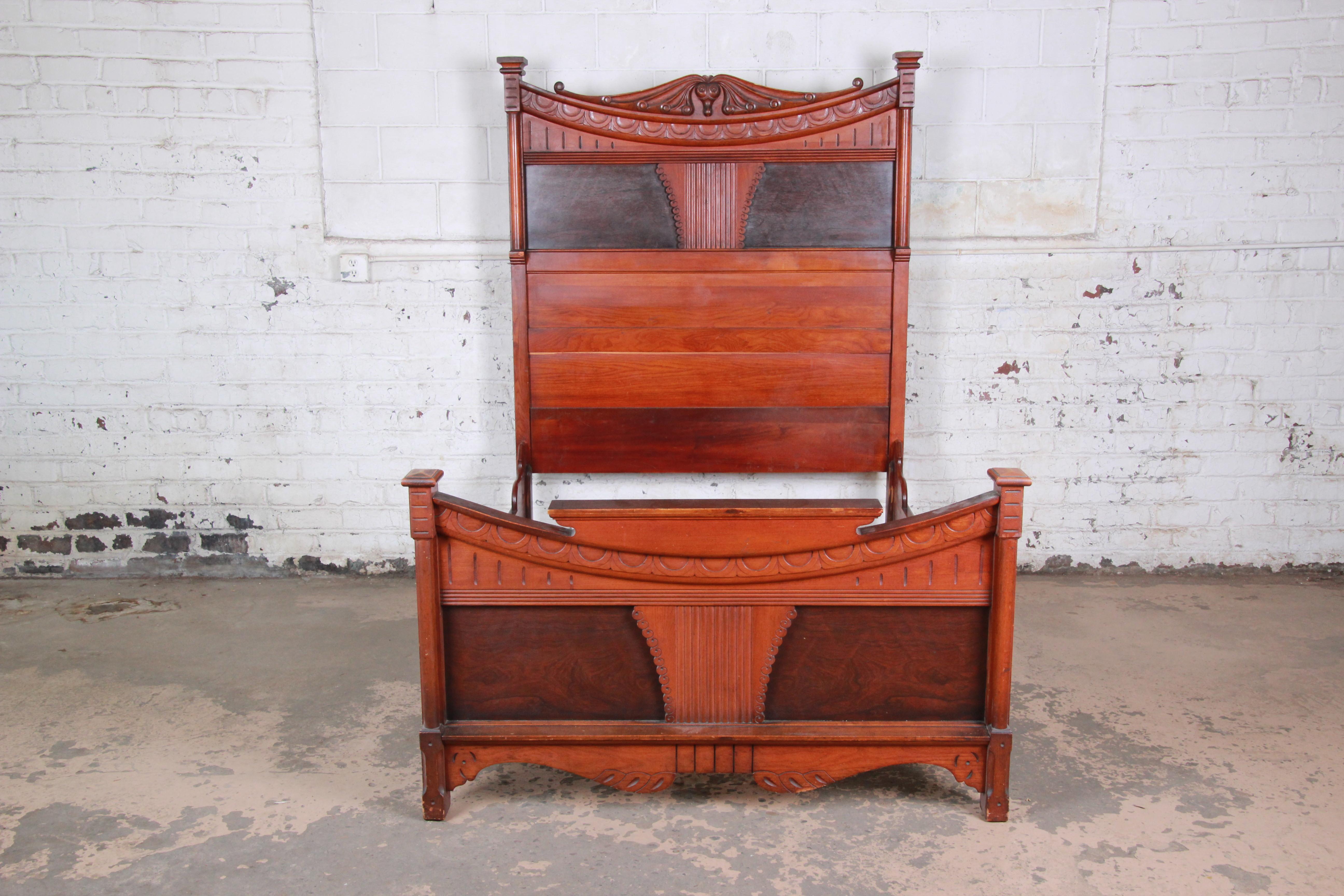 American Antique Victorian Carved Walnut and Rosewood Full Size Bed Frame, circa 1870