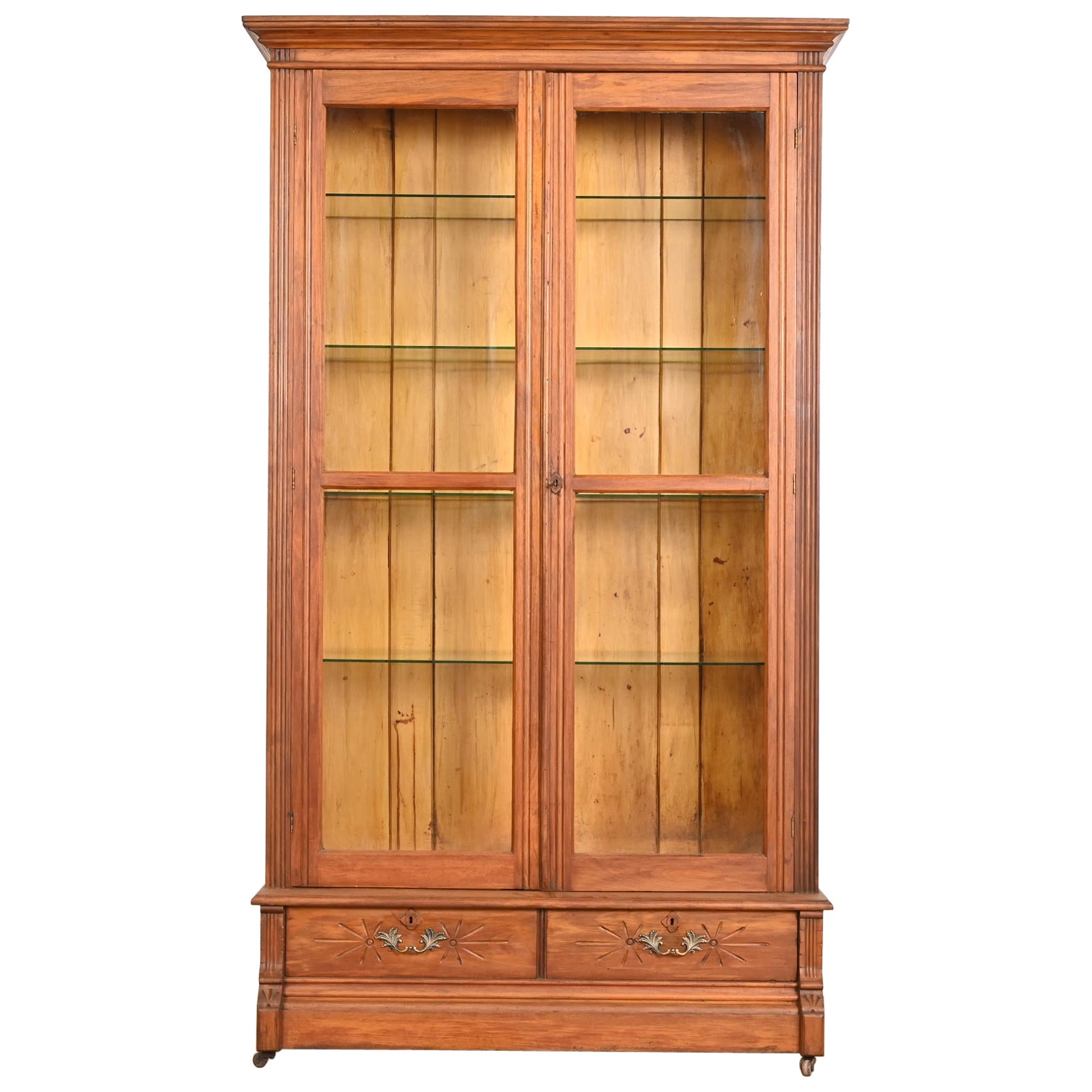 Antique Victorian Carved Walnut Glass Front Bookcase, Circa 1880s For Sale