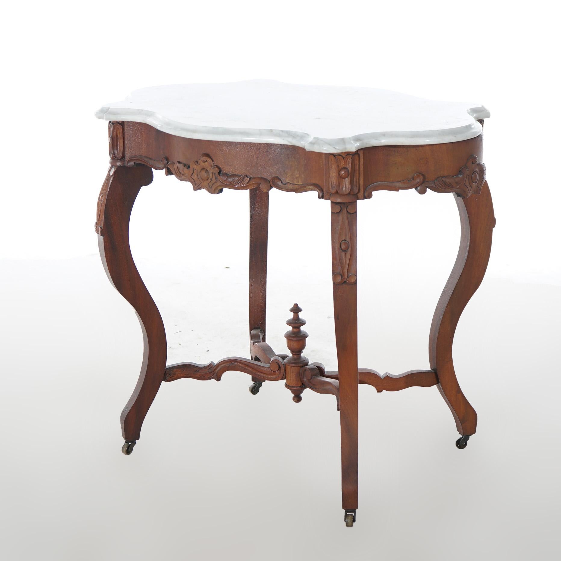 Antiker viktorianischer Parlor-Tisch aus geschnitztem Nussbaum und Marmor mit Schildkrötenplatte, um 1890 (Viktorianisch) im Angebot