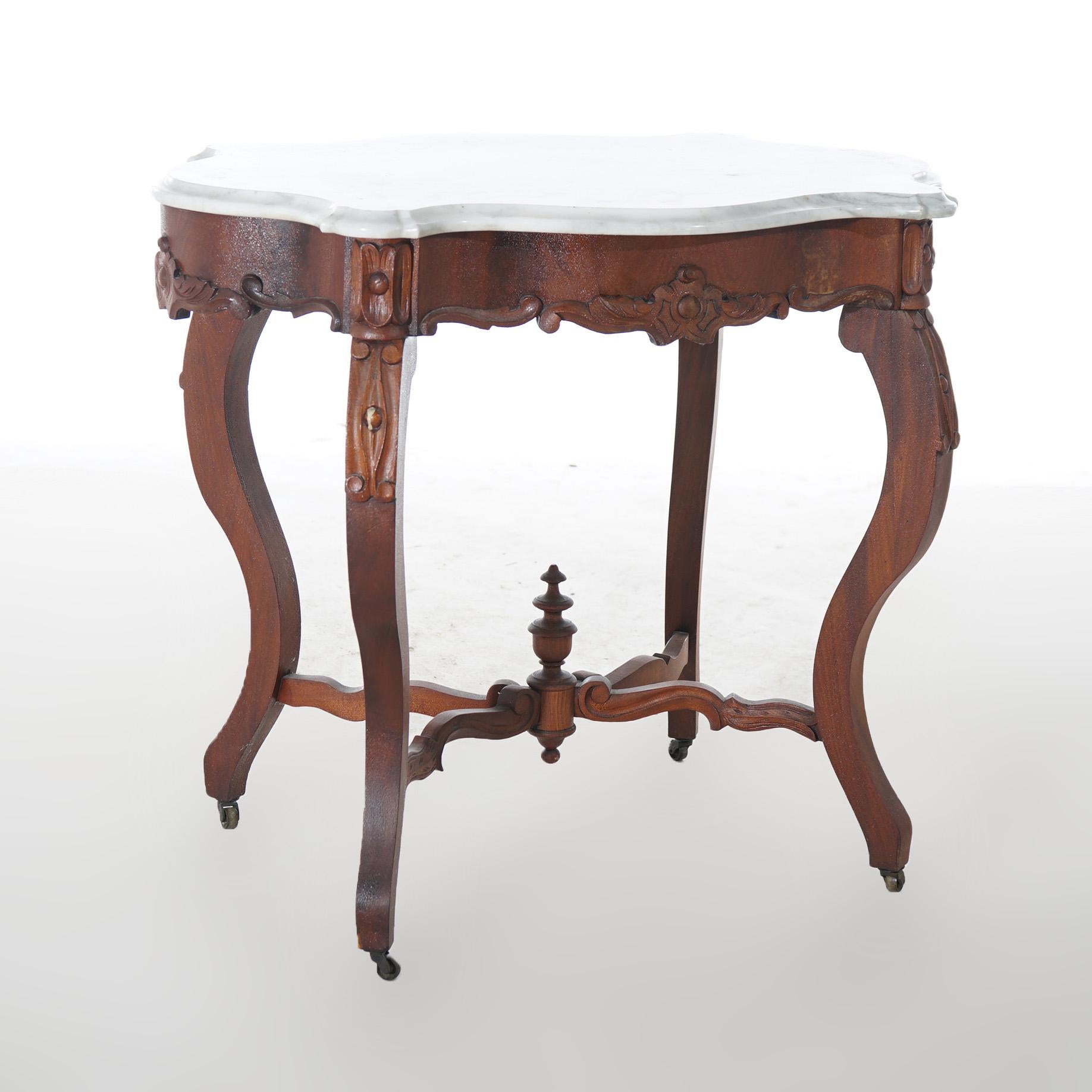 Antiker viktorianischer Parlor-Tisch aus geschnitztem Nussbaum und Marmor mit Schildkrötenplatte, um 1890 (Geschnitzt) im Angebot