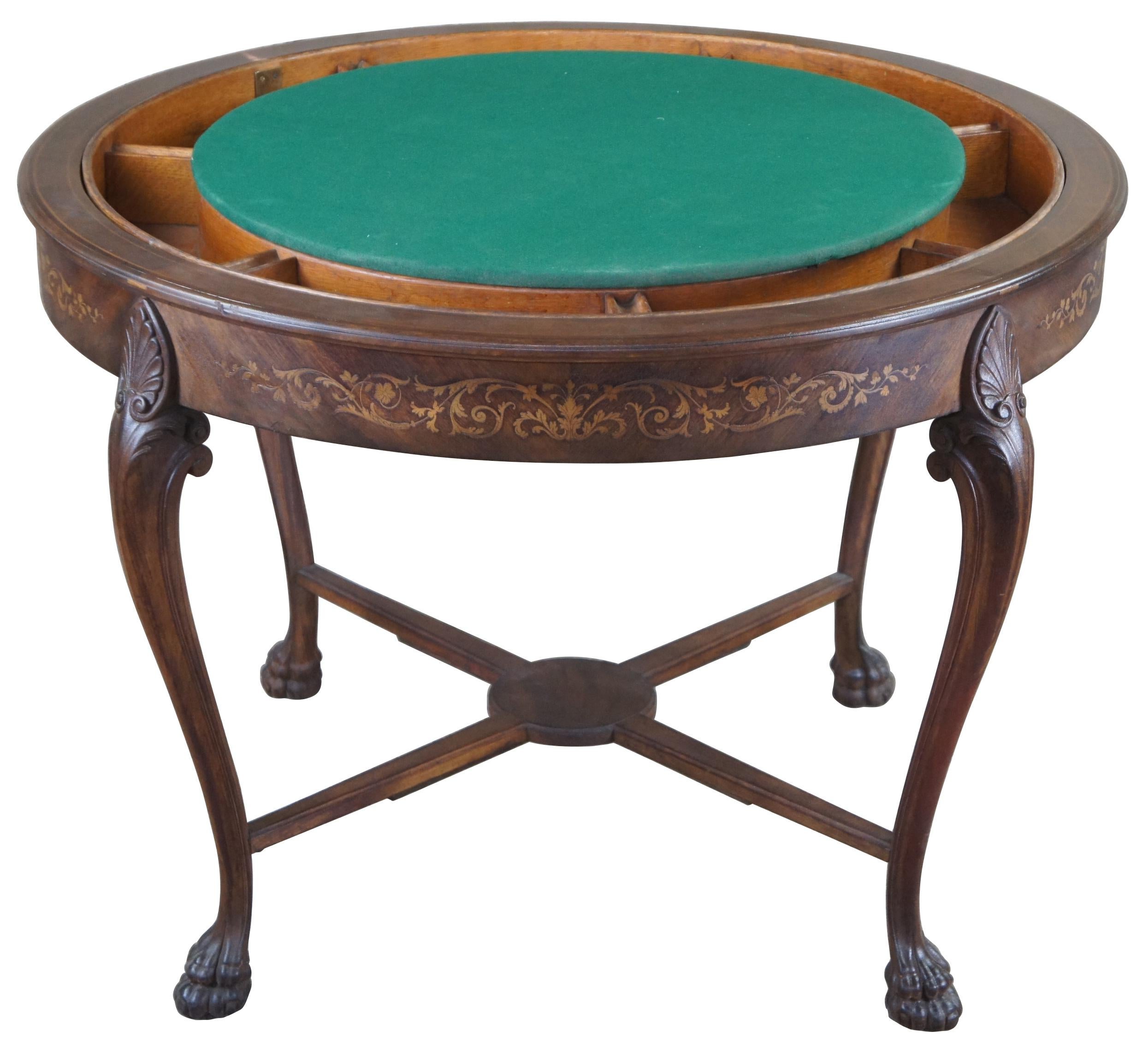 Rare antique Victorian flip top poker or game table. Finely carved and scalloped walnut featuring marquetry inlay design, serpentine cabriole legs and paw feet. Convertible center is released via a hidden brass latch and opens to a stunning baize