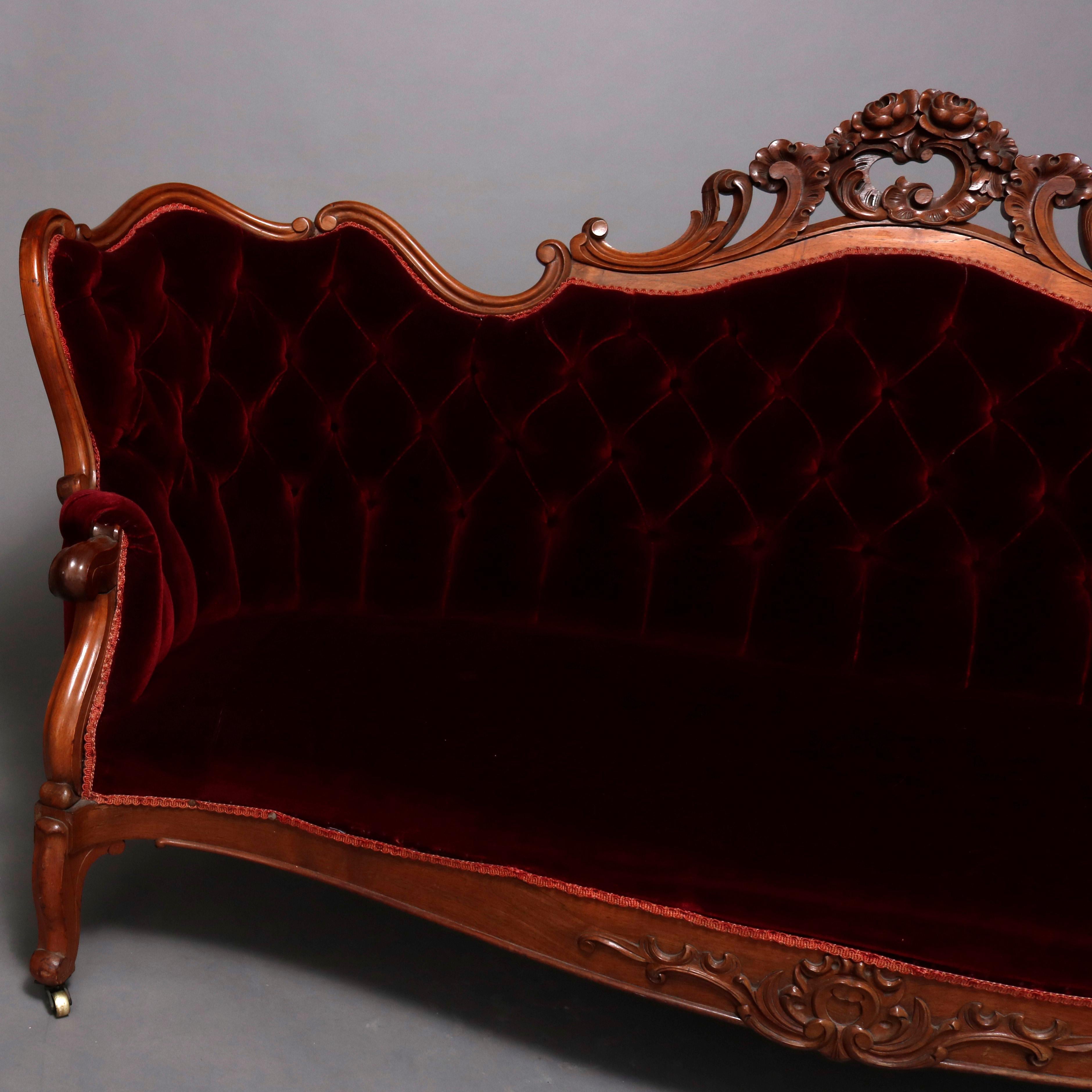Antique Victorian Carved Walnut and Plum Button Back Velvet Sofa, circa 1890 In Good Condition In Big Flats, NY