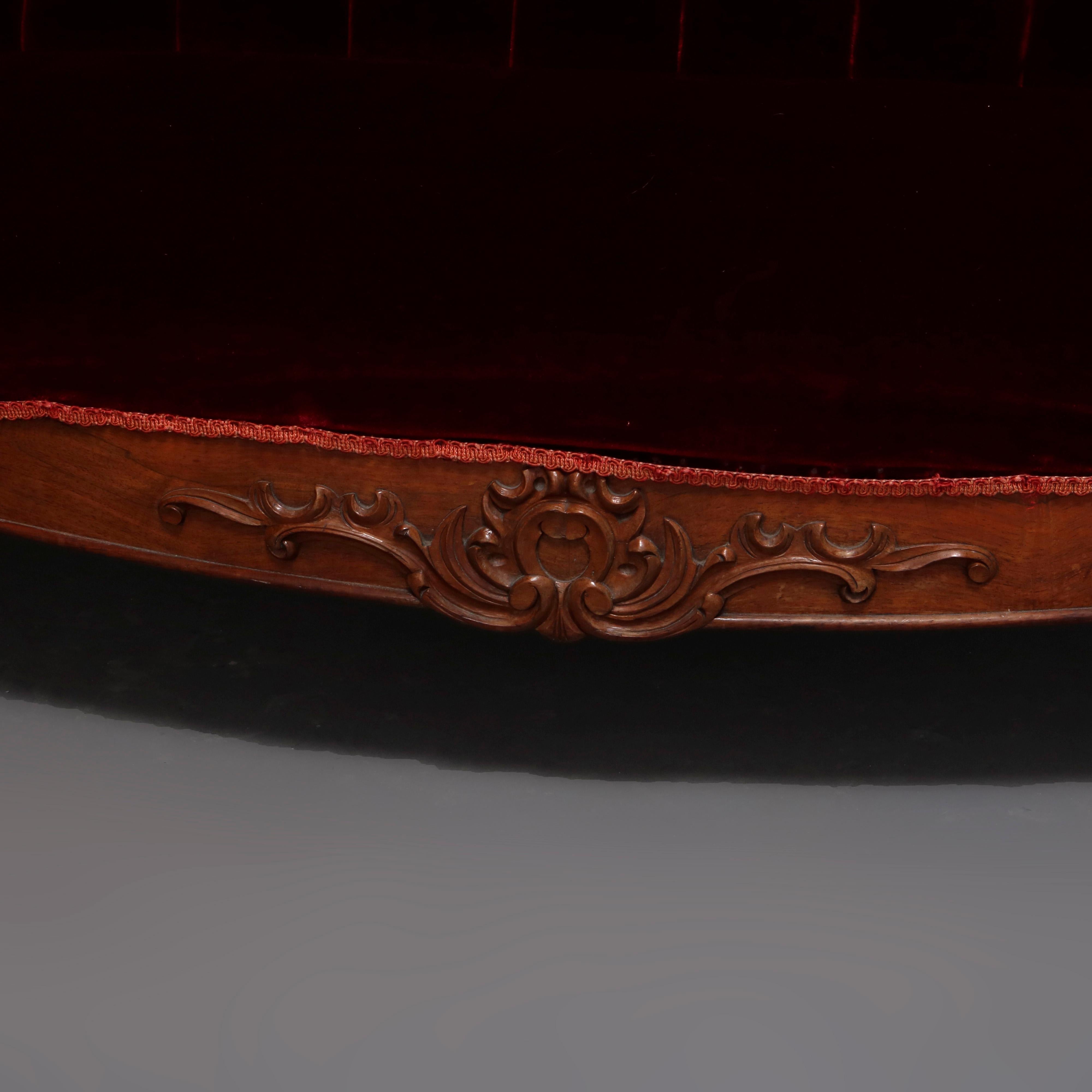 19th Century Antique Victorian Carved Walnut and Plum Button Back Velvet Sofa, circa 1890