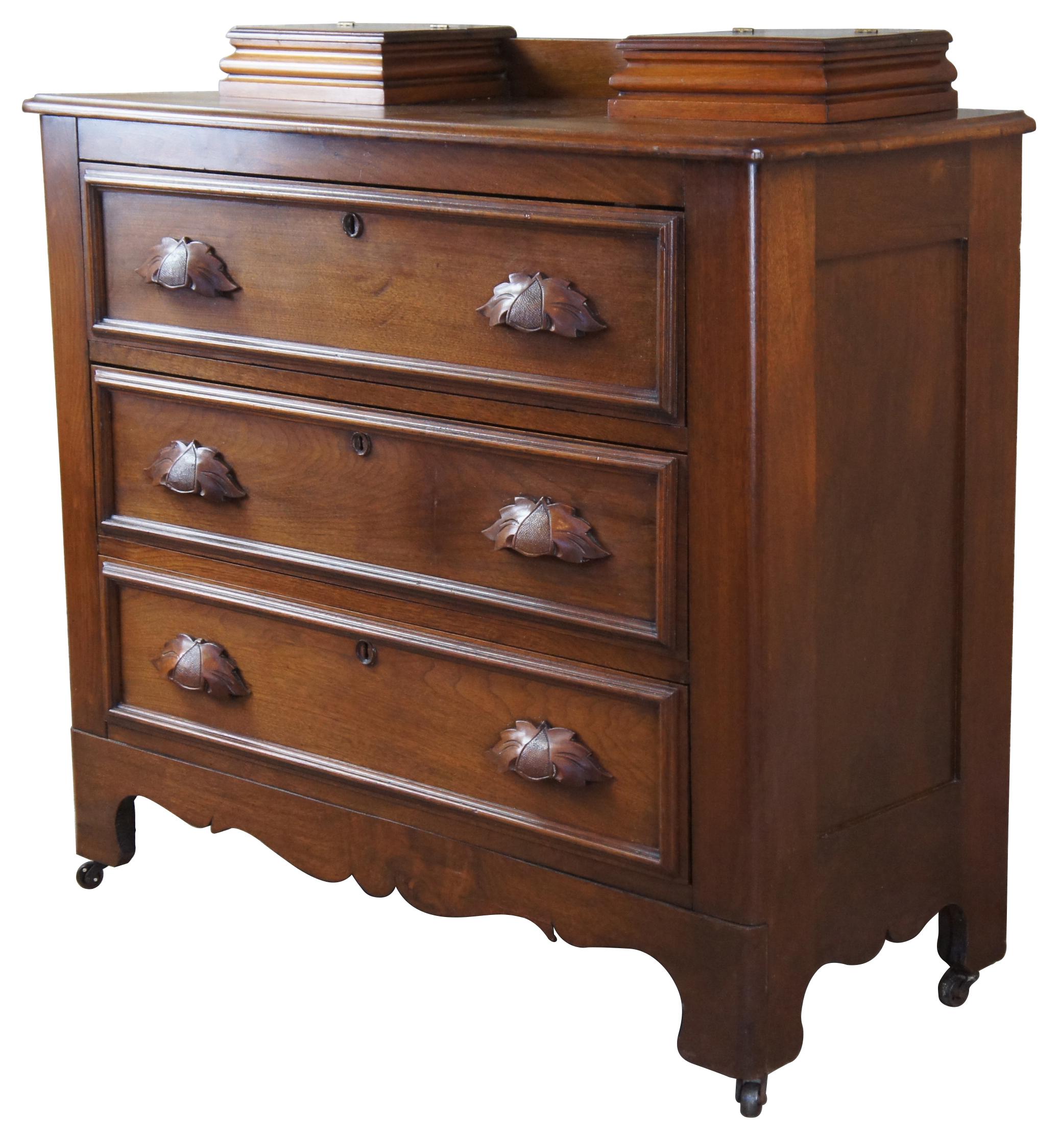 Circa 1880s Victorian dresser. Made from walnut with two glovebox drawers over three larger lower drawers. Features ovular shaped drawer trim, leaf carved pulls and serpentine cut lower apron. The drawers are constructed using the Knapp Joint. The