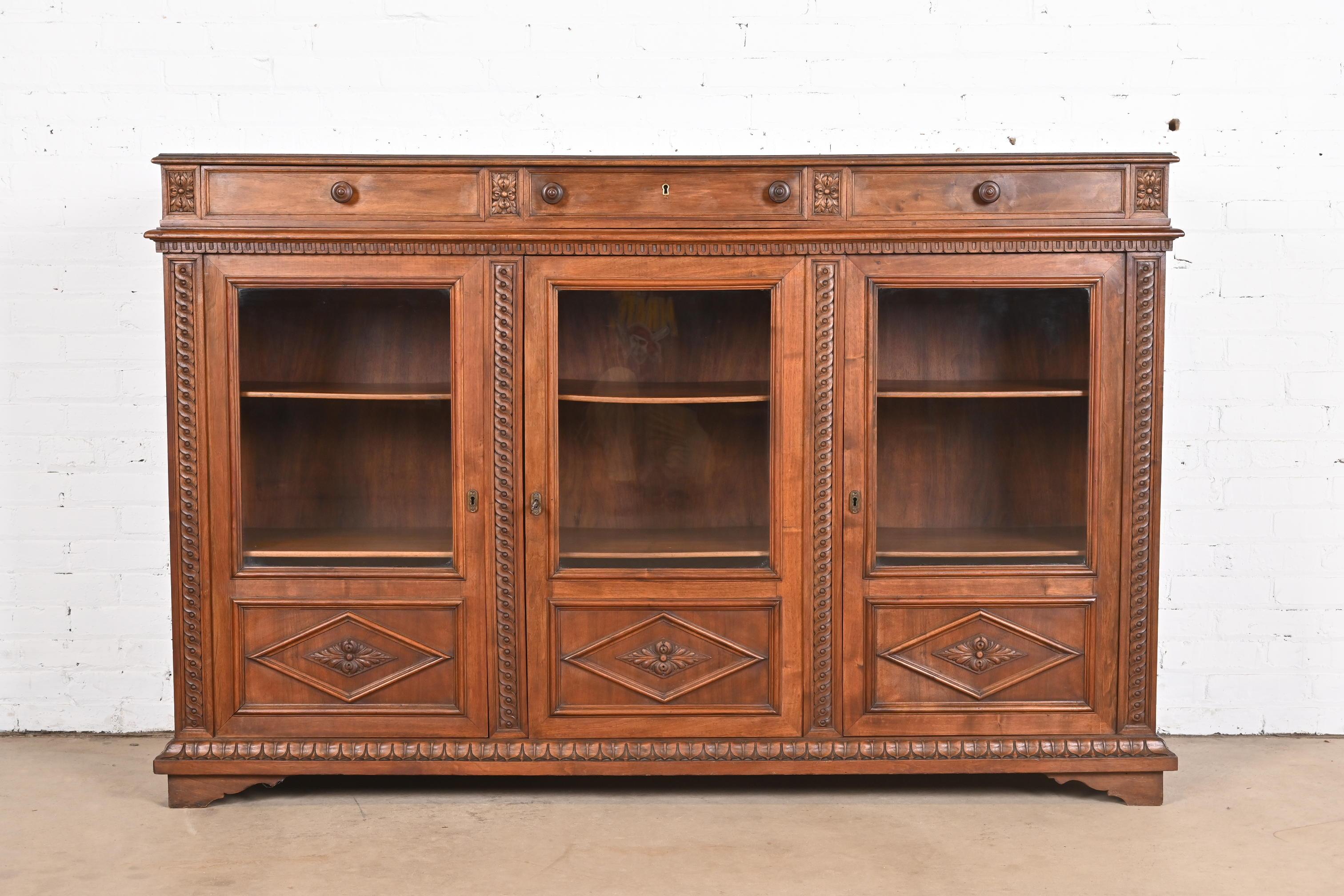Antique Victorian Carved Walnut Triple Bookcase, Circa 1890s In Good Condition In South Bend, IN