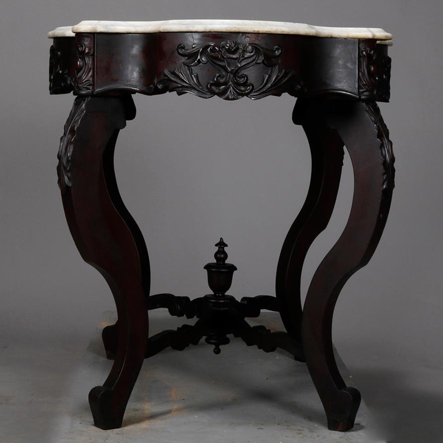 American Antique Victorian Carved Walnut Turtle Top Marble-Top Table, circa 1890