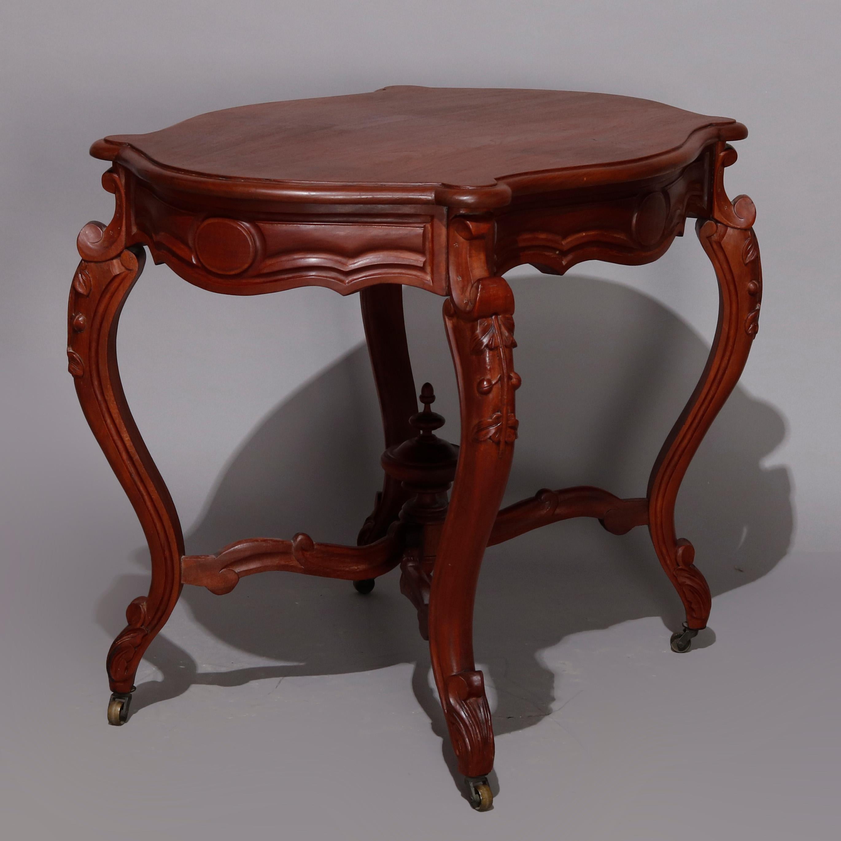 American Antique Victorian Carved Walnut Turtle Top Parlor Table, circa 1890