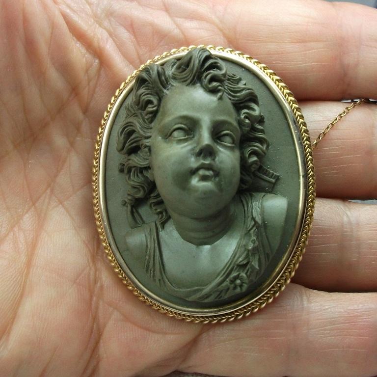 lava cameo brooch