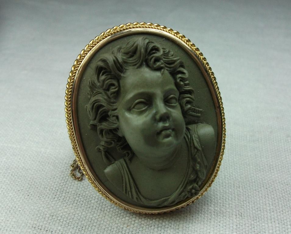Antique Victorian Cased Lava Stone Front Face Cupid Cameo Brooch For Sale 1