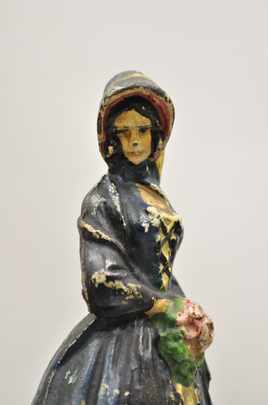 Early 20th Century Antique Victorian Cast Iron Figural Colonial Woman Painted Door Stop For Sale