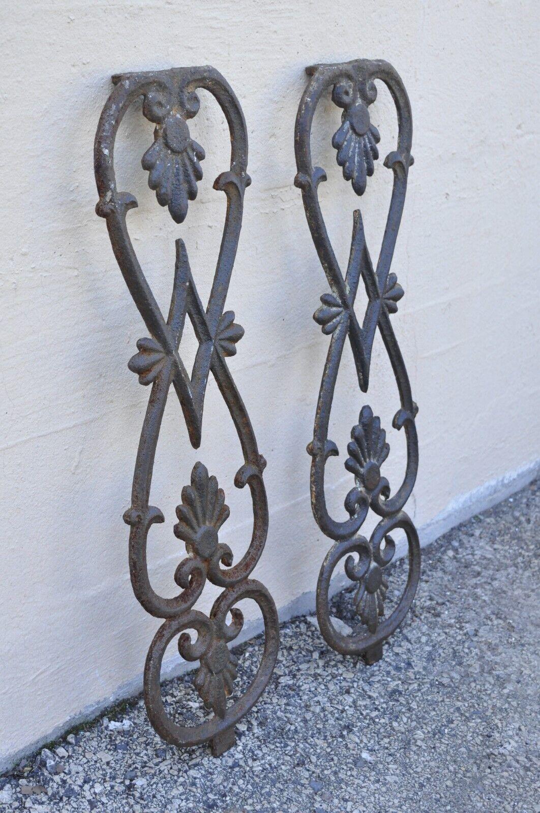 Antique Victorian cast iron gate supports architectural elements - a pair. Item features cast iron construction, ornate forms, great to use as supports for a DIY table project, very nice antique pair. Circa 1900. Measurements: 27.5
