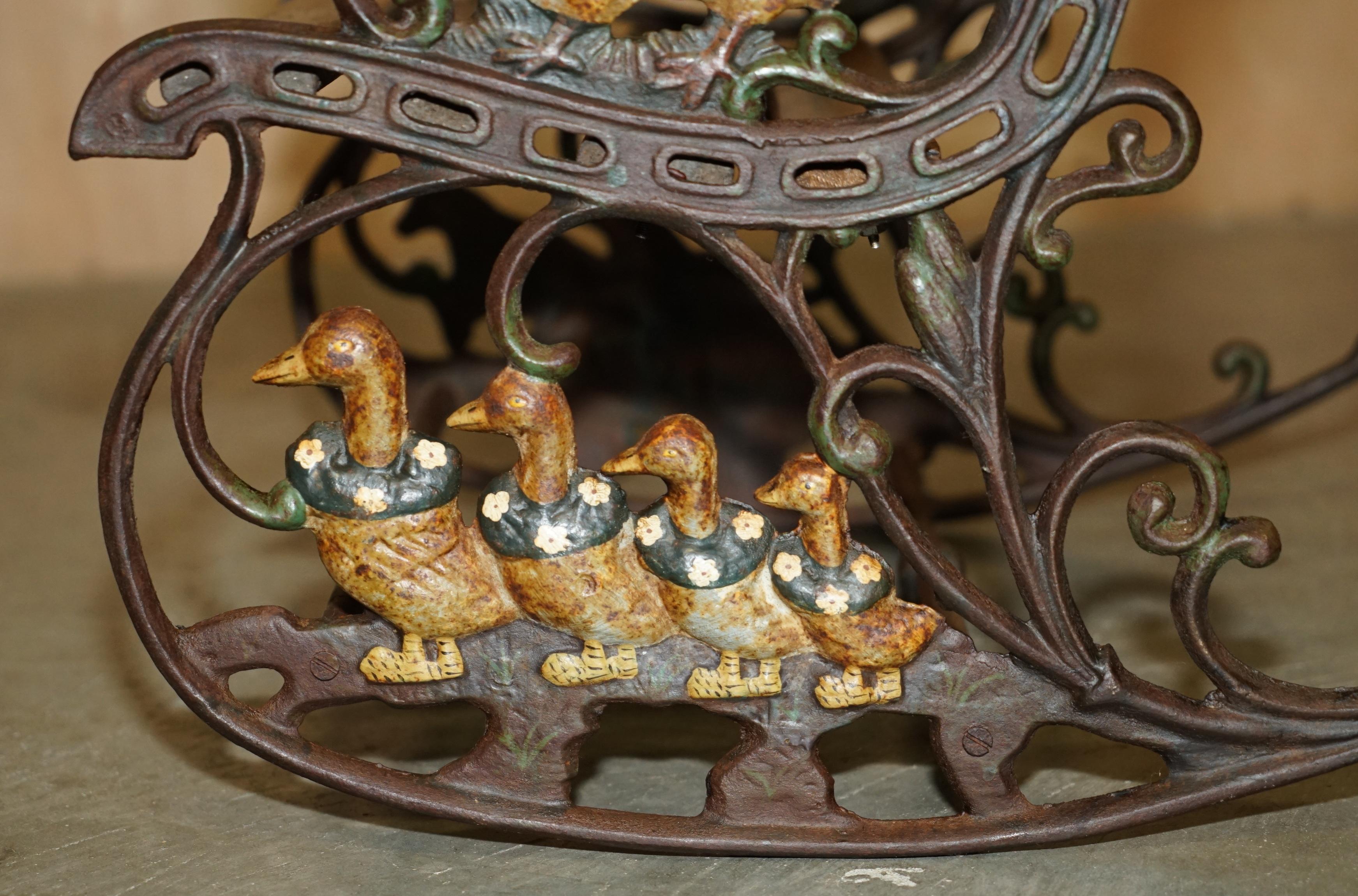 ANTiQUE VICTORIAN CAST IRON HAND PAINTED SMALL CHILDRENS GARDEN ROCKING ARMCHAIR For Sale 3