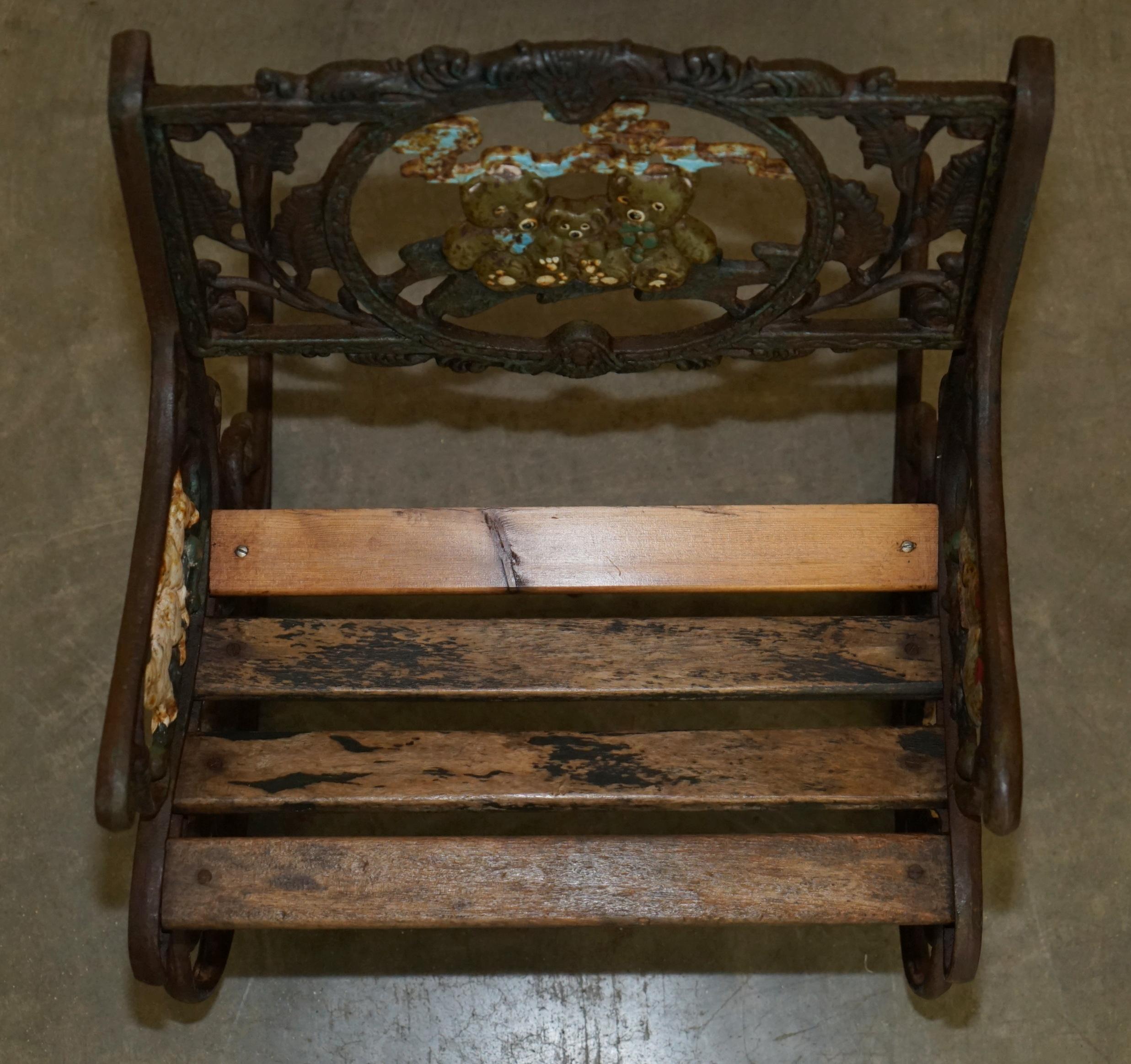 English ANTiQUE VICTORIAN CAST IRON HAND PAINTED SMALL CHILDRENS GARDEN ROCKING ARMCHAIR For Sale
