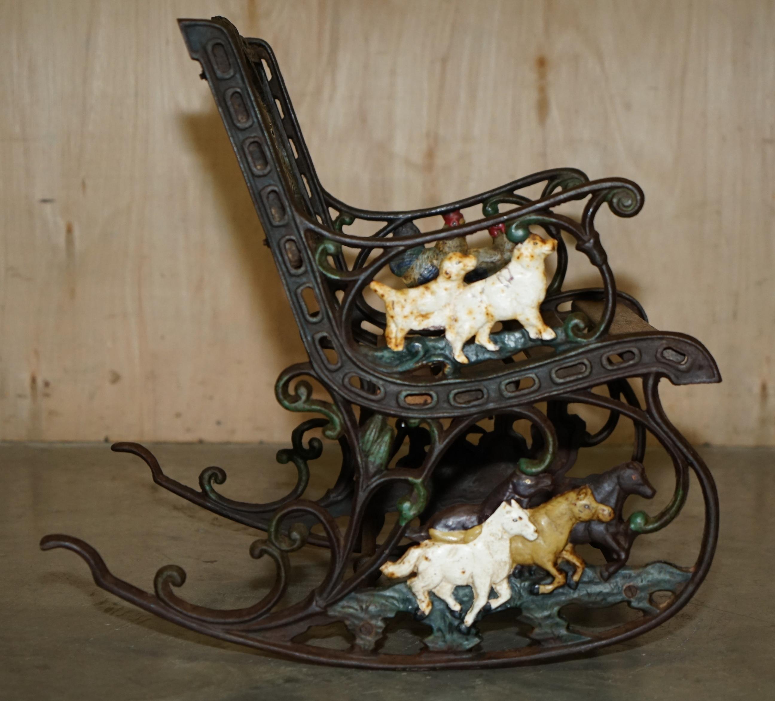 Hand-Crafted ANTiQUE VICTORIAN CAST IRON HAND PAINTED SMALL CHILDRENS GARDEN ROCKING ARMCHAIR For Sale