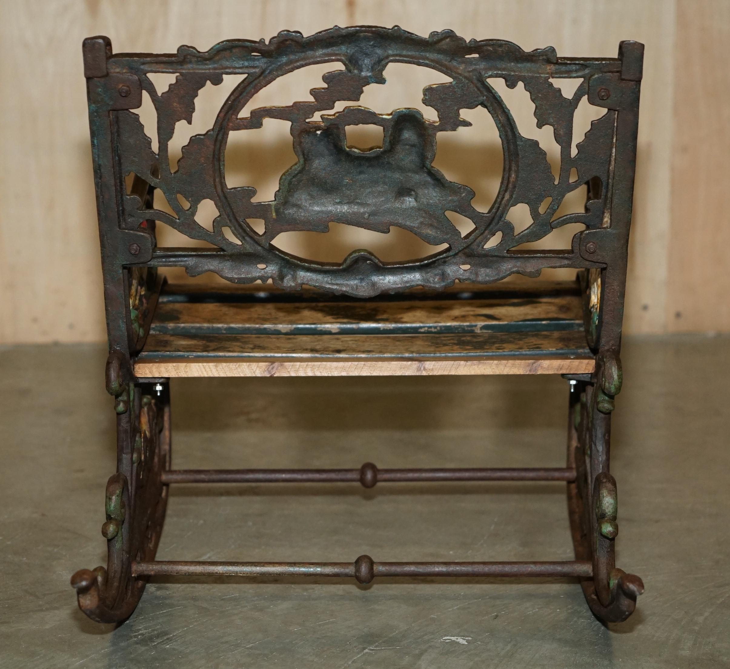 Iron ANTiQUE VICTORIAN CAST IRON HAND PAINTED SMALL CHILDRENS GARDEN ROCKING ARMCHAIR For Sale