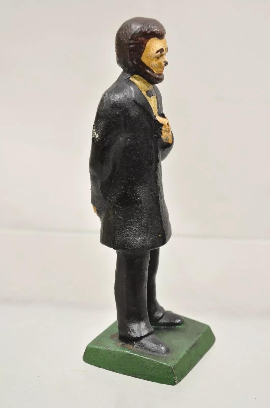 Antique Victorian Cast Iron Honest Abe Abraham Lincoln Figural Painted Door Stop In Good Condition For Sale In Philadelphia, PA