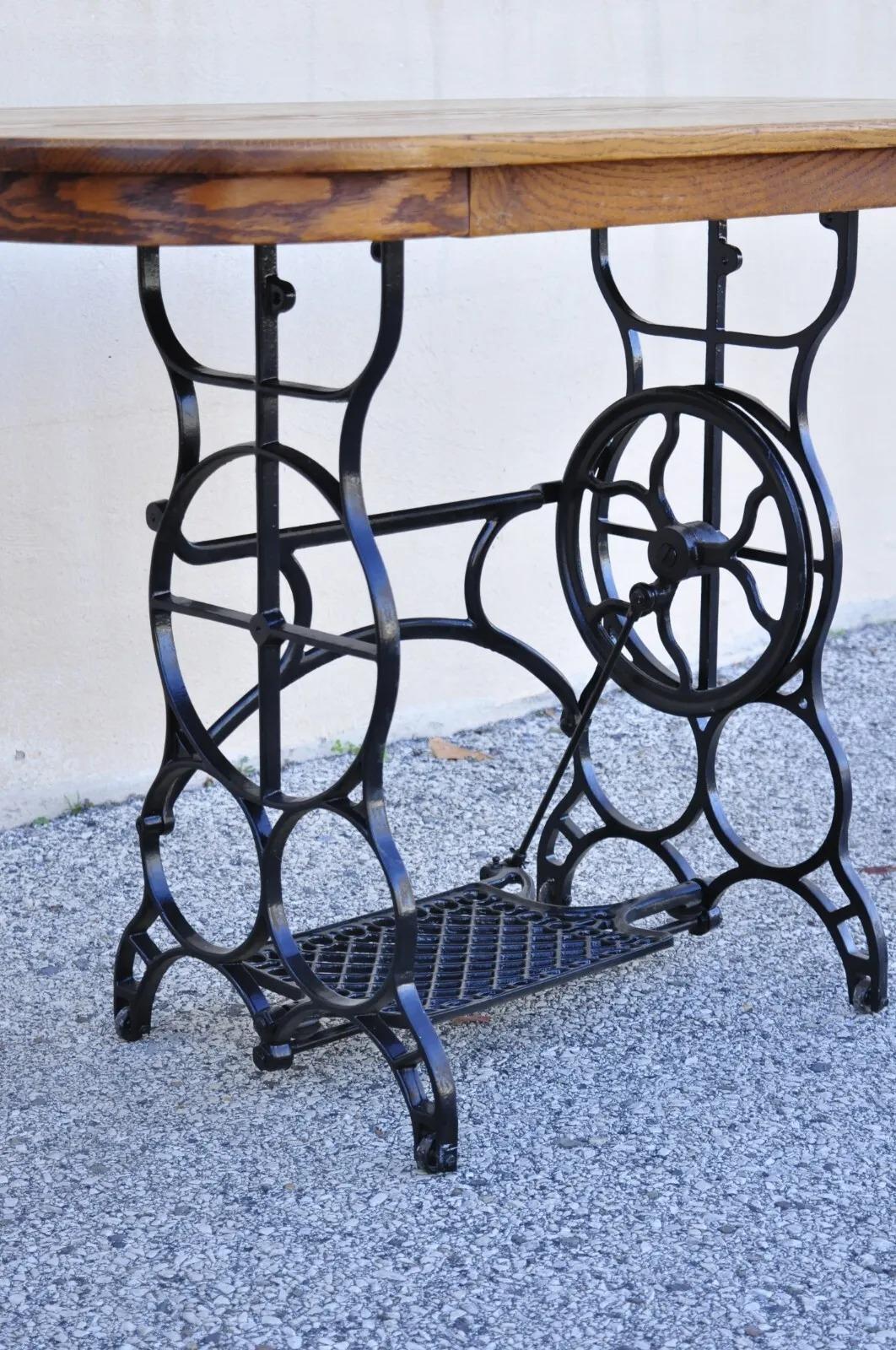 Antique Victorian Cast Iron Treadle Sewing Machine Base Side Table Oval Oak Top In Good Condition For Sale In Philadelphia, PA