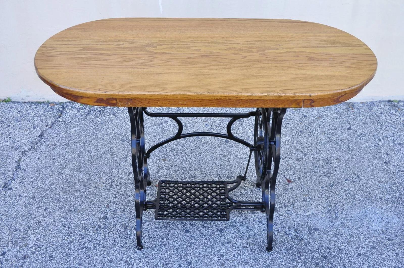 20th Century Antique Victorian Cast Iron Treadle Sewing Machine Base Side Table Oval Oak Top For Sale