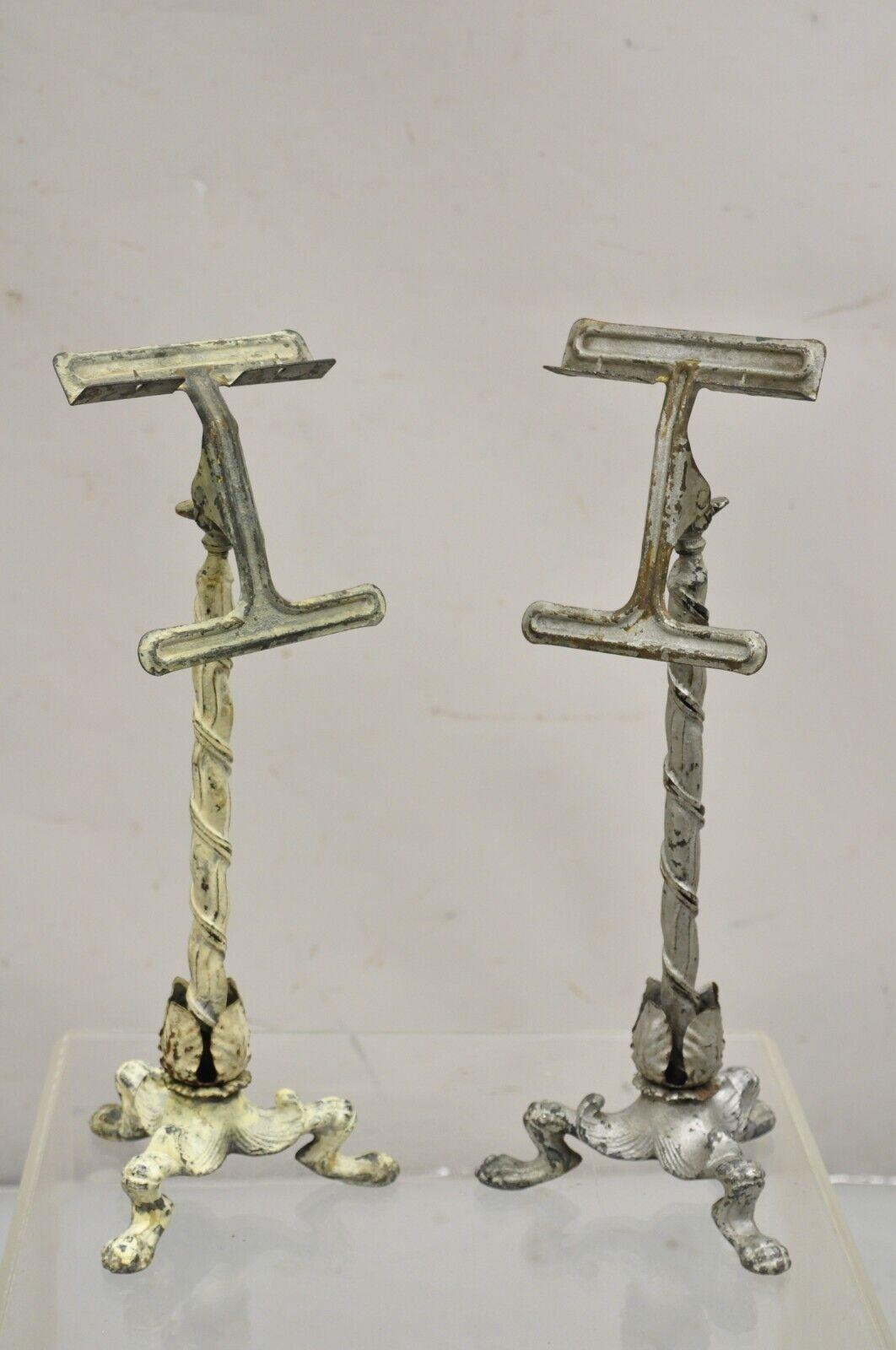 Antique Victorian Cast Iron Tripod Paw Feet General Store Retail Display Stands - a Pair. Item features a pivoting easel, distressed painted finish, very unique antique stands. Circa 19th Century. Measurements: 16.5